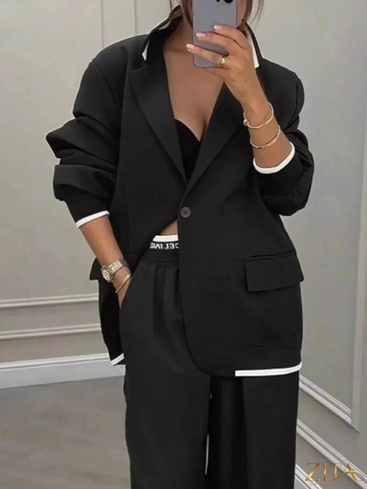 Plus size Zita La Belle Elite blazer and wide-leg pants set, featuring a single-button blazer and matching wide-leg trousers.