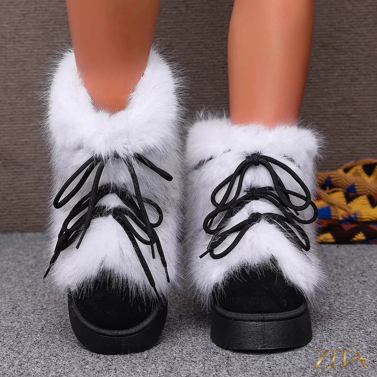 Zita La Belle Elite winter faux fur trimmed lace-up boots with stylish design and cozy fur detail for cold weather.