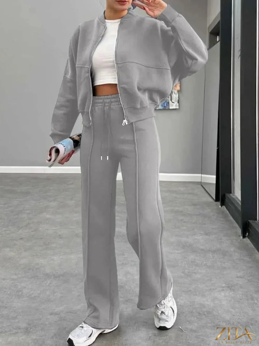 Zita La Belle Elite baseball collar zip-up outerwear and drawstring pants set, front view showing black and white design and casual fit.
