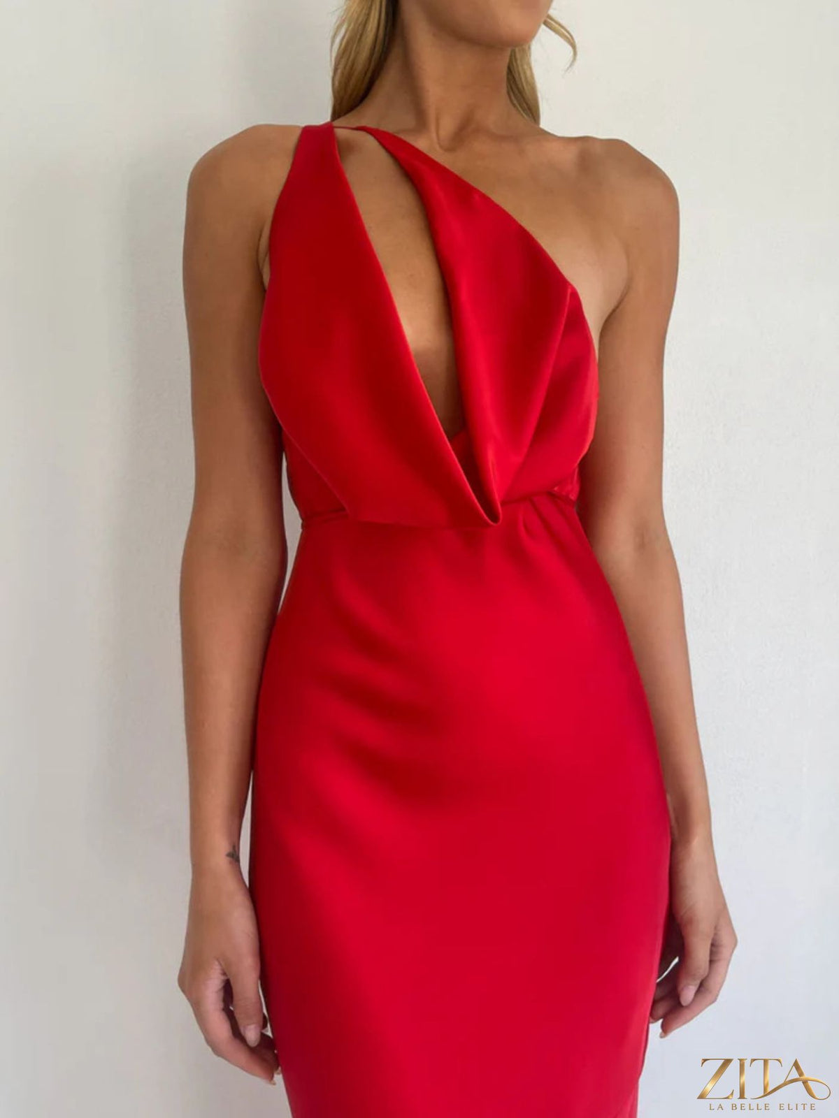 Zita La Belle Elite satin halter neck maxi dress displayed on a hanger, featuring a flowing silhouette and elegant design.