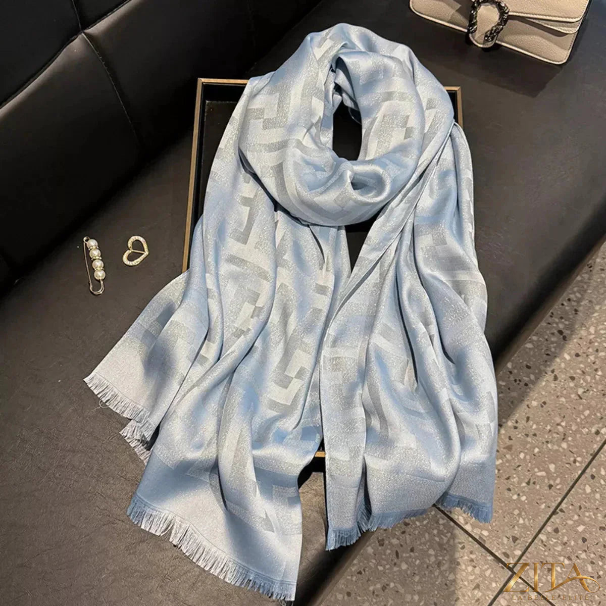 Raw hem scarf from Trendsi featuring soft fabric and frayed edges, styled for a casual, boho-inspired look.