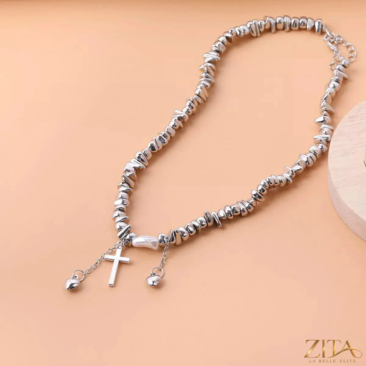 Zita La Belle Elite chunky chain cross pendant necklace featuring a bold gold-tone design and intricate cross charm.