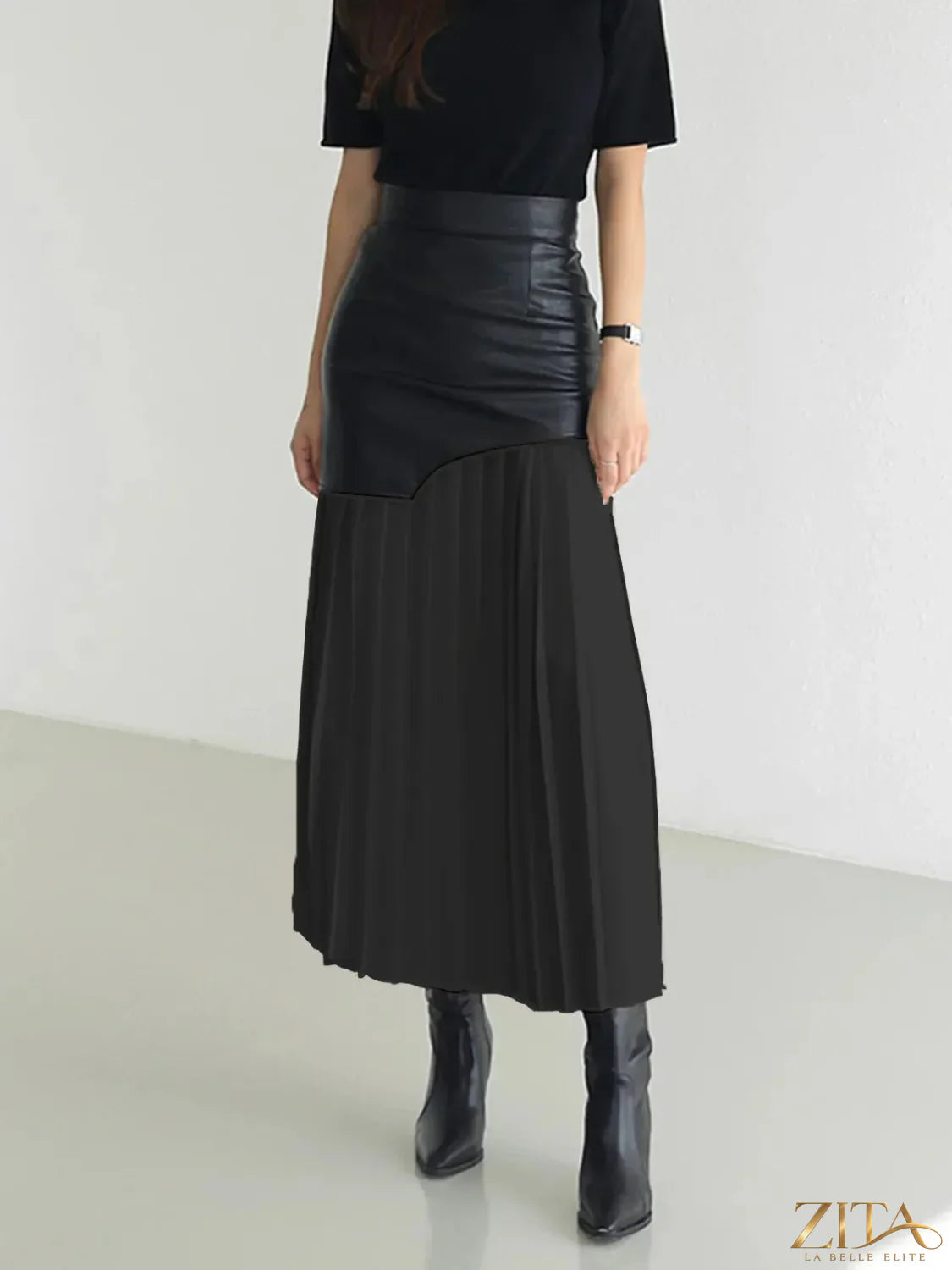 Patchwork contrast pleated skirt by Trendsi featuring colorful fabric panels and a high-waisted, flowy design.