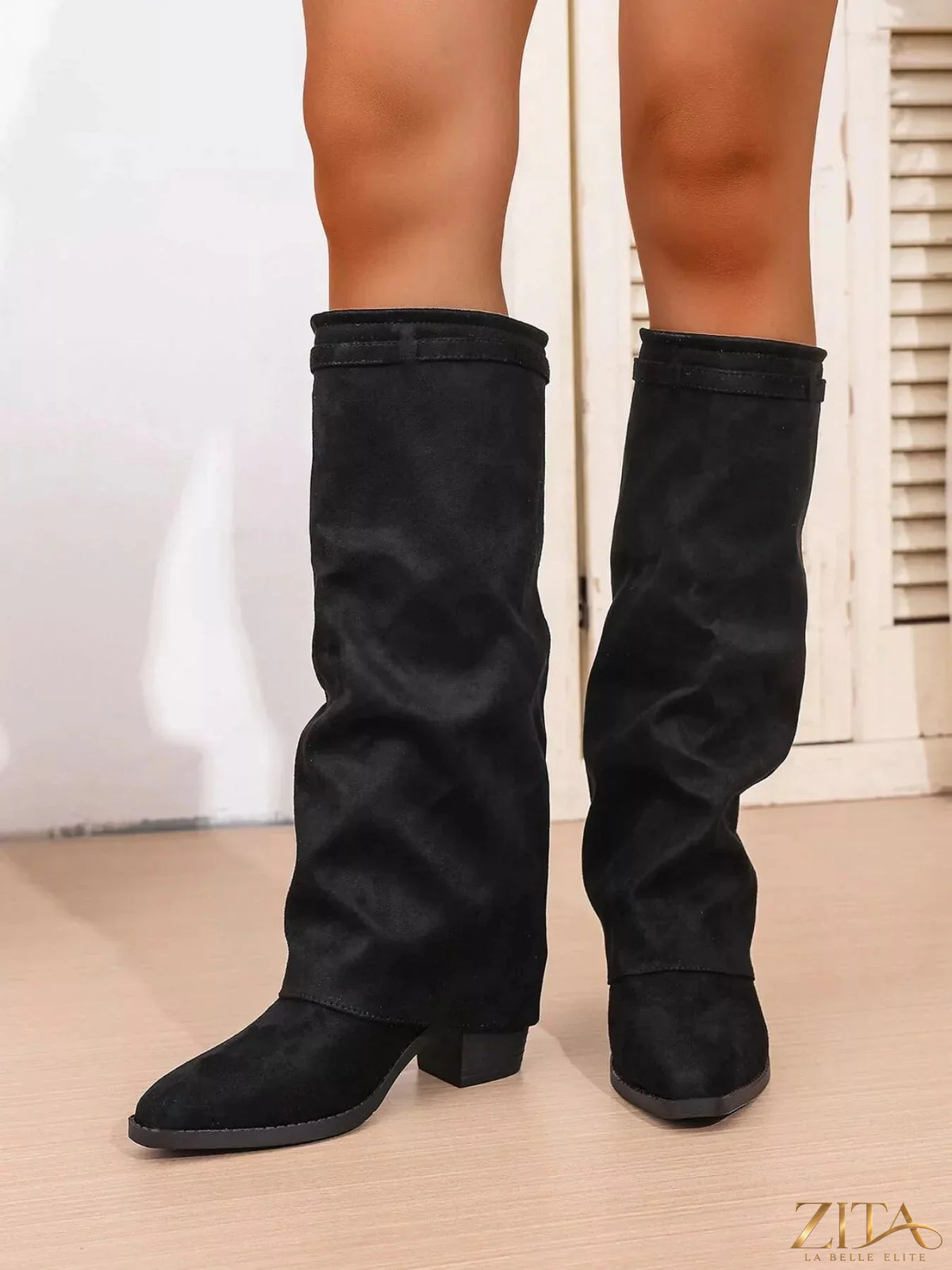 Zita La Belle Elite point toe block heel boots in black leather, showcasing sleek design and sturdy chunky heels.