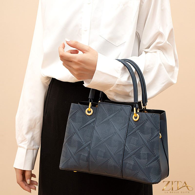 Zita La Belle Elite top-handle handbag in sleek leather with sturdy top handle and gold-tone hardware, stylish and elegant accessory