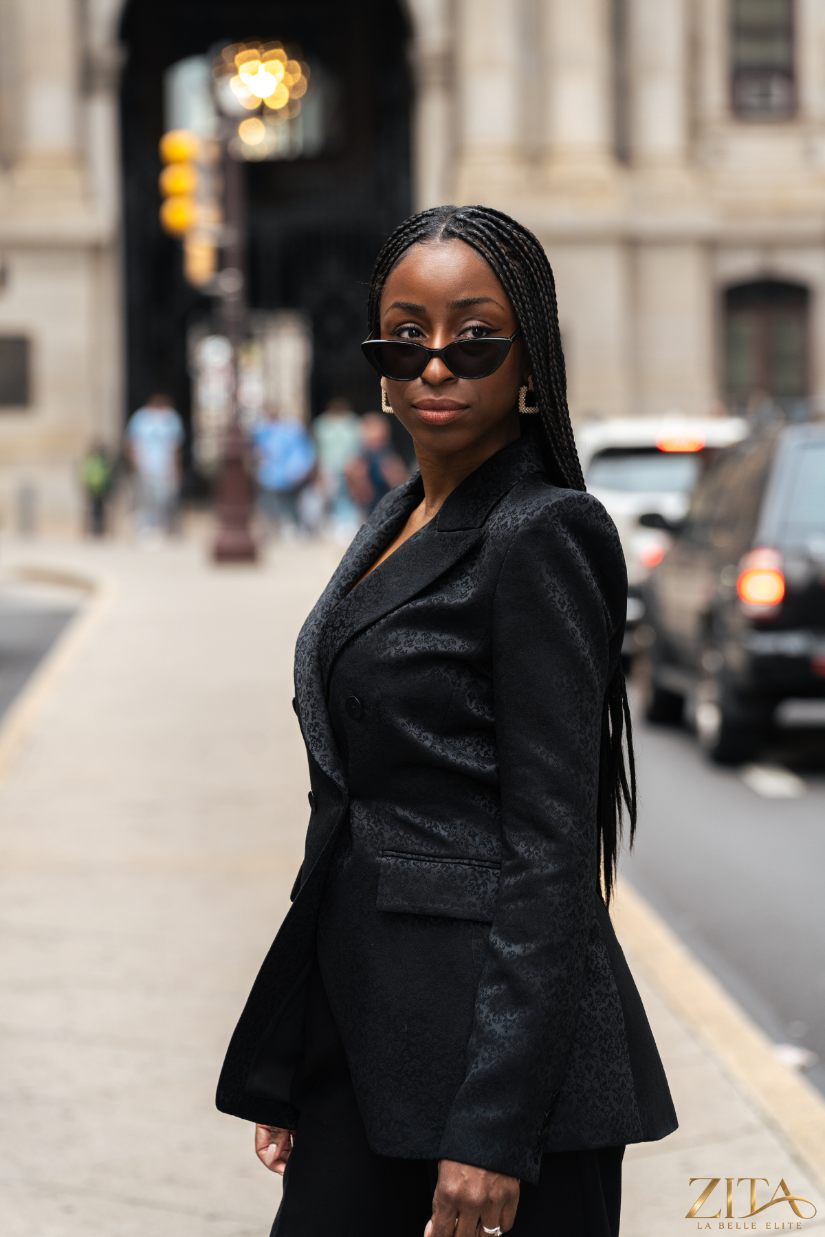 Zita La Belle Elite PREMIER black blazer shown on a hanger, tailored fit with sleek lapels and long sleeves for a stylish professional look.
