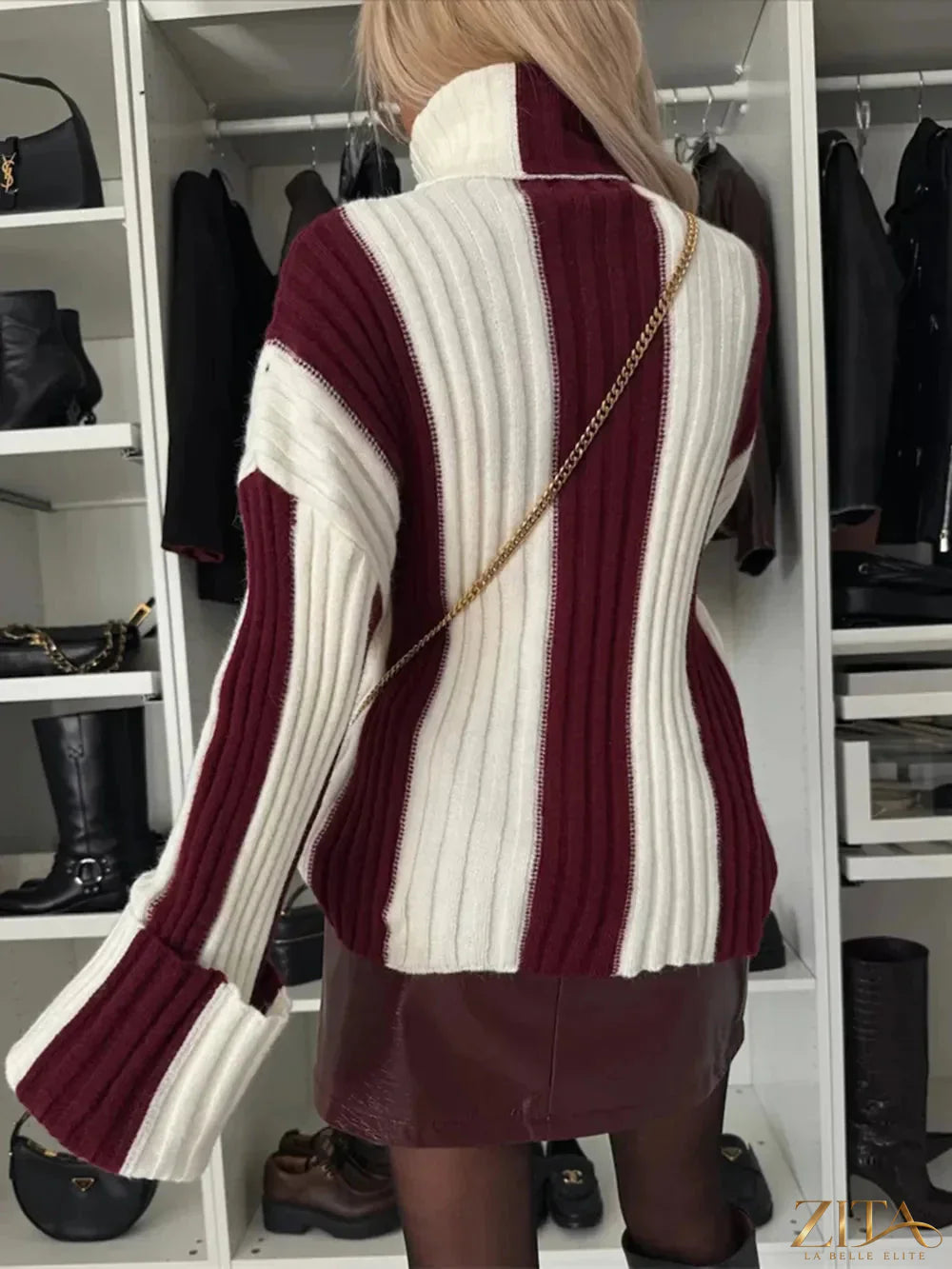 Striped turtleneck dropped shoulder sweater by Trendsi featuring bold horizontal stripes and a cozy, relaxed fit.