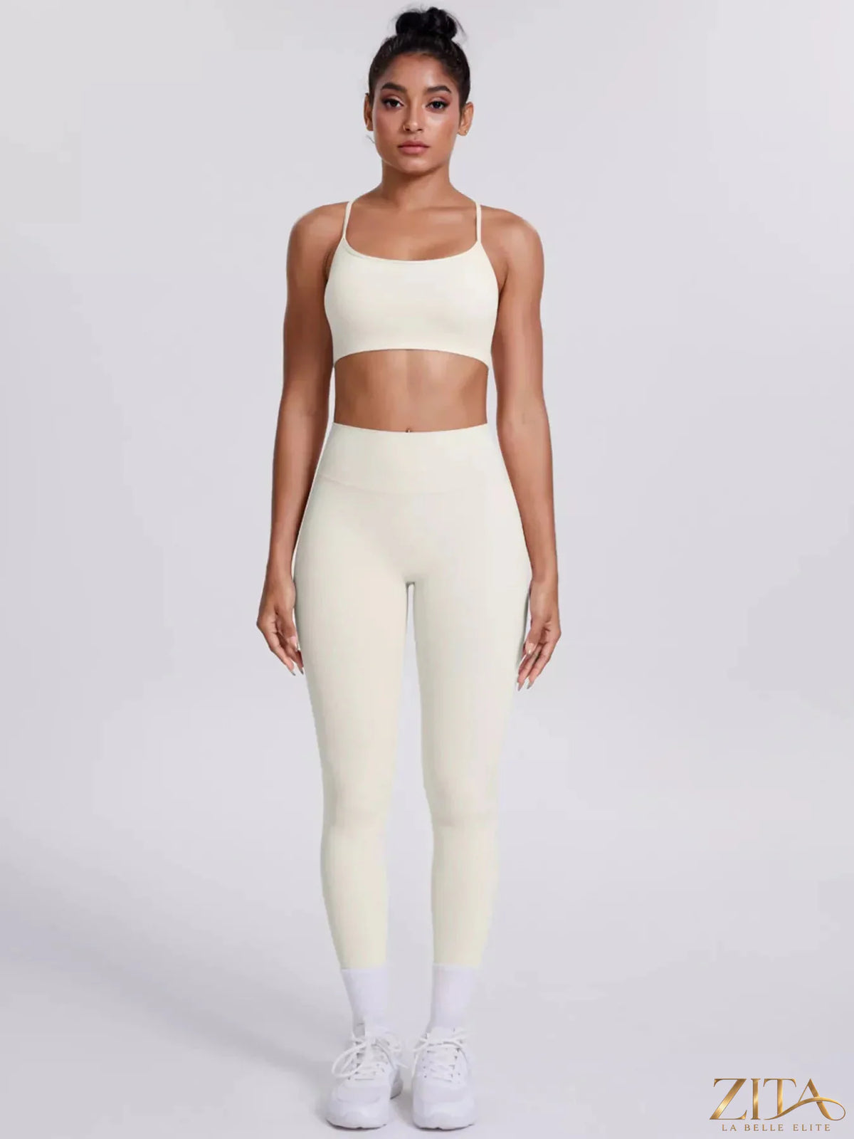 Zita La Belle Elite criss-cross back cami and matching black leggings active set on a model, ideal for workout or yoga.