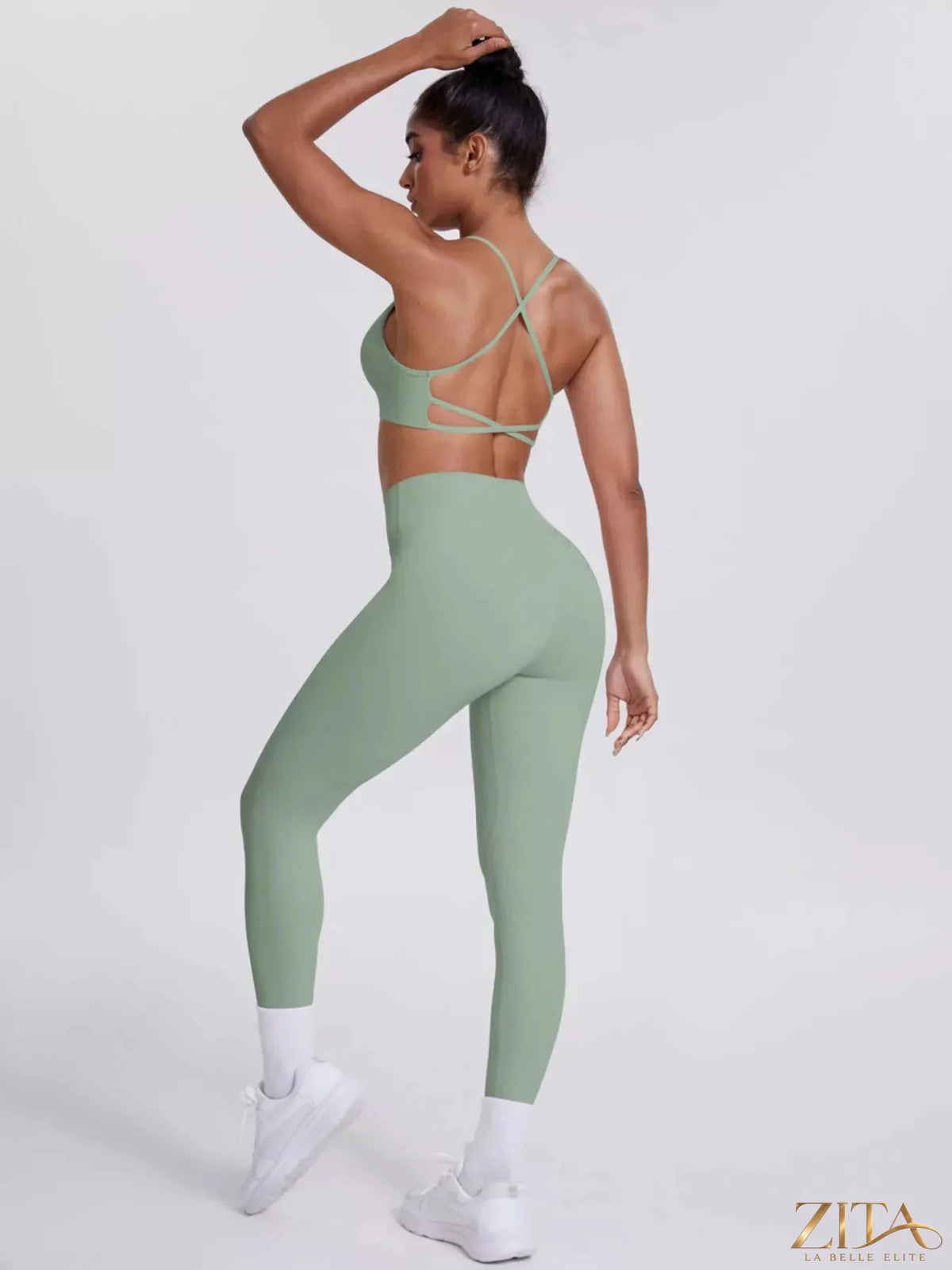 Zita La Belle Elite criss-cross back cami and matching black leggings active set on a white background