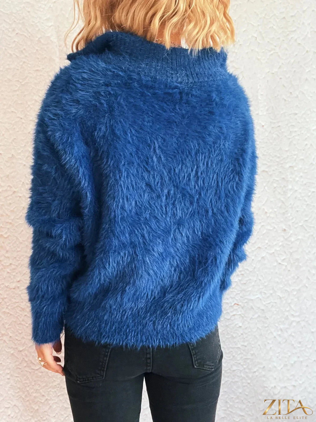 Zita La Belle Elite cozy fuzzy half-zip sweater in soft neutral color, featuring a high collar and relaxed fit.