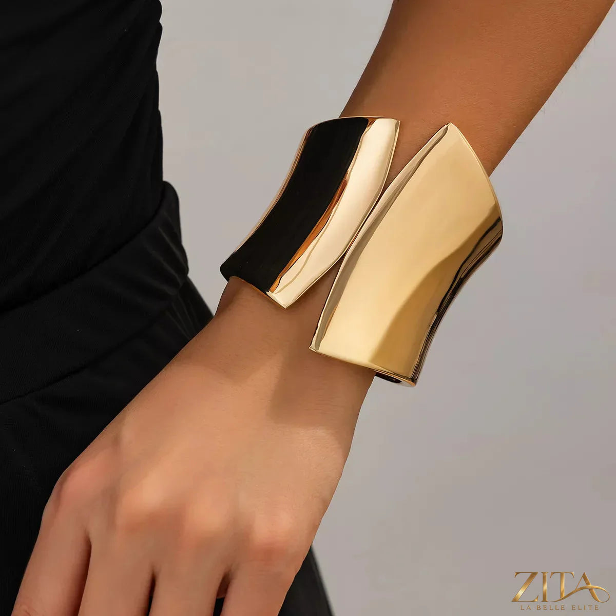 Zita La Belle Elite wide cuff bracelet featuring sleek metal design with smooth finish and open-ended style.