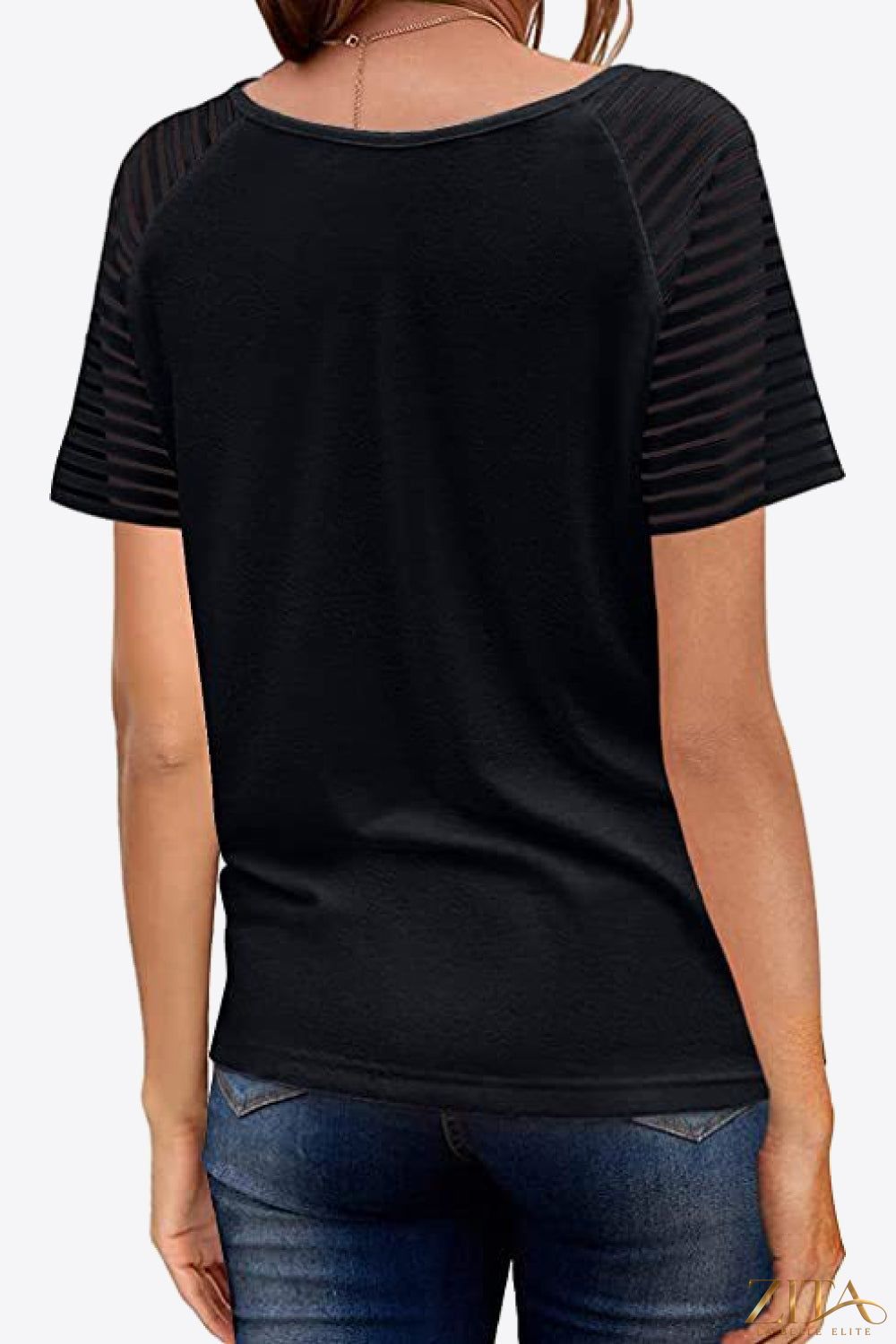 V-Neck Raglan Sleeve Tee by Trendsi, featuring contrasting sleeve colors and a comfortable fit, shown on a model.