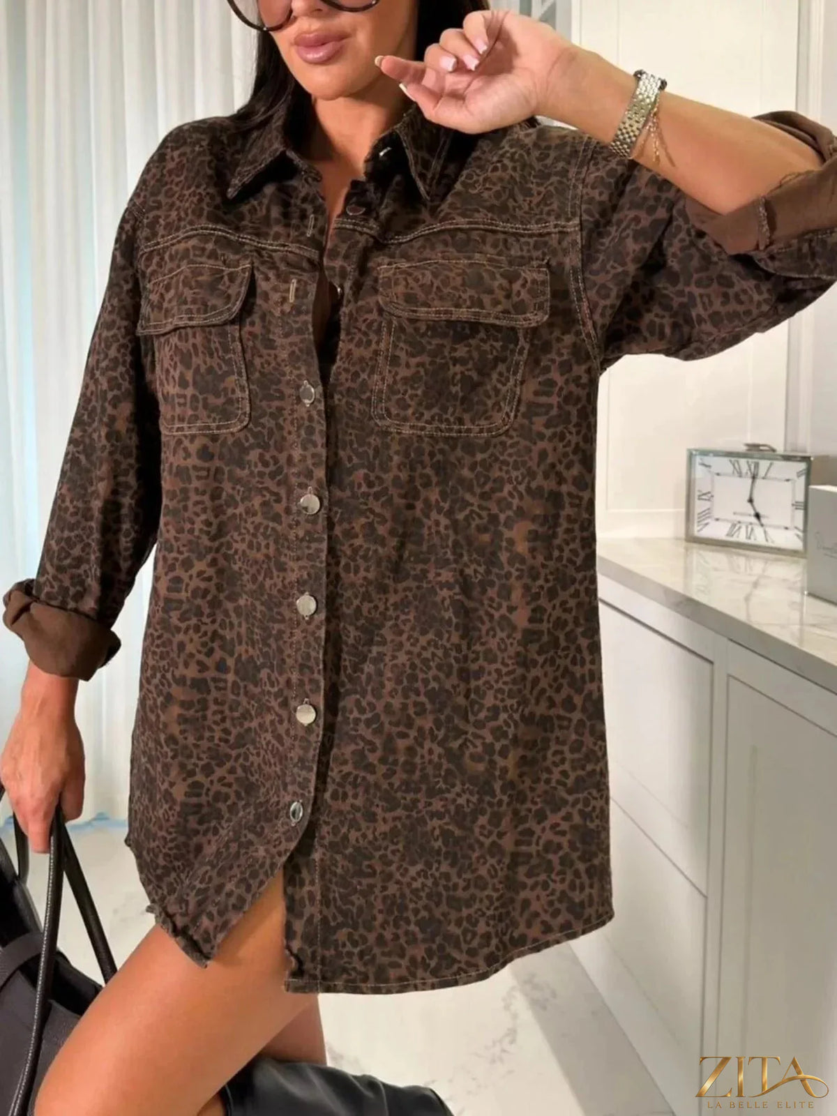 Vintage washed denim jacket with chest pockets from Zita La Belle Elite, featuring classic denim styling and rugged texture.