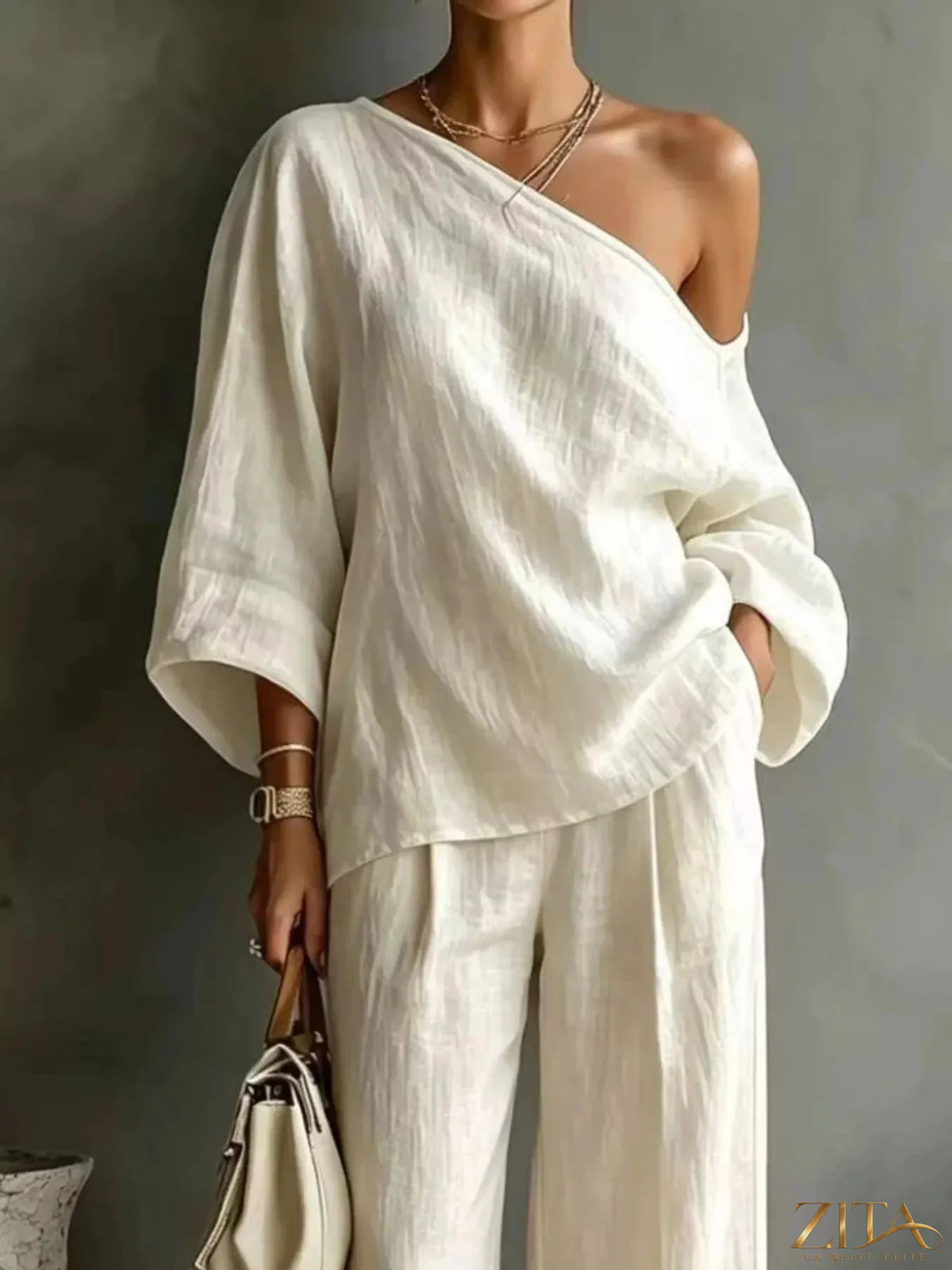 Zita La Belle Elite one shoulder top and wide leg pants set, stylish fashion ensemble with fitted top and flowy trousers.