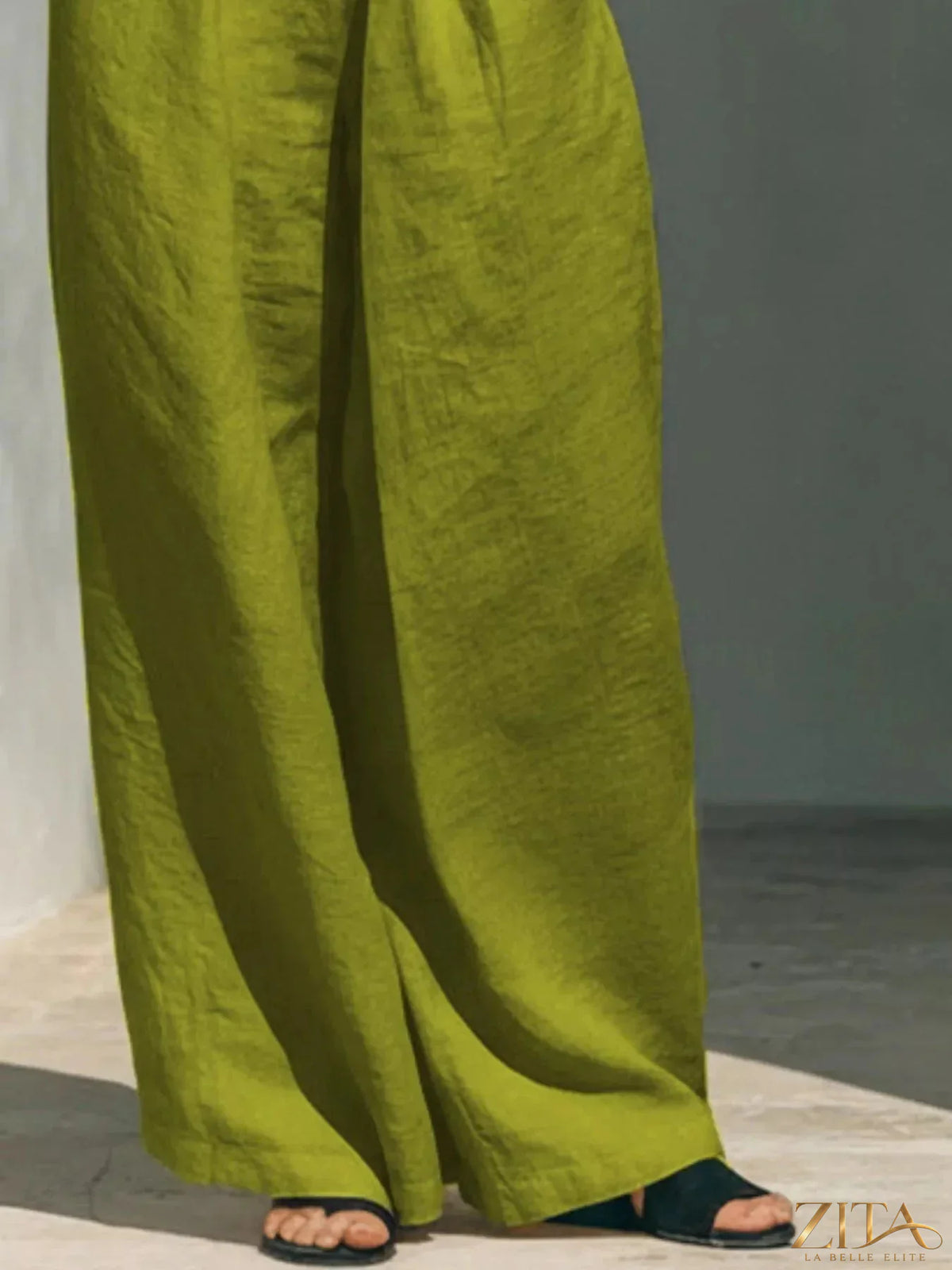 Plus size Zita La Belle Elite sleeveless turtleneck top and wide-leg pants set, shown in a full-length view.