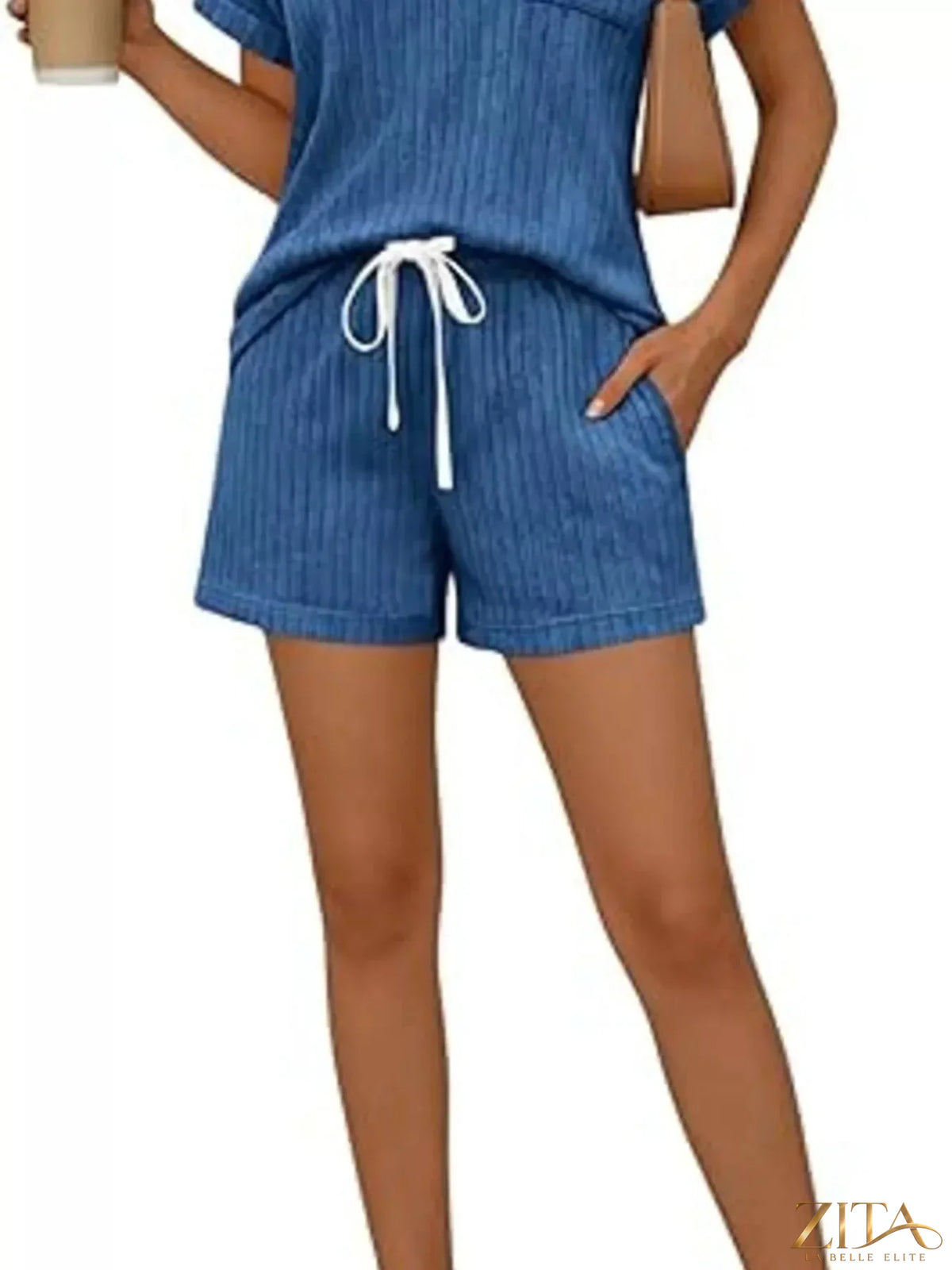 Casual ribbed knit tee and shorts set by Trendsi, featuring a comfortable, stylish matching outfit in soft knit fabric.