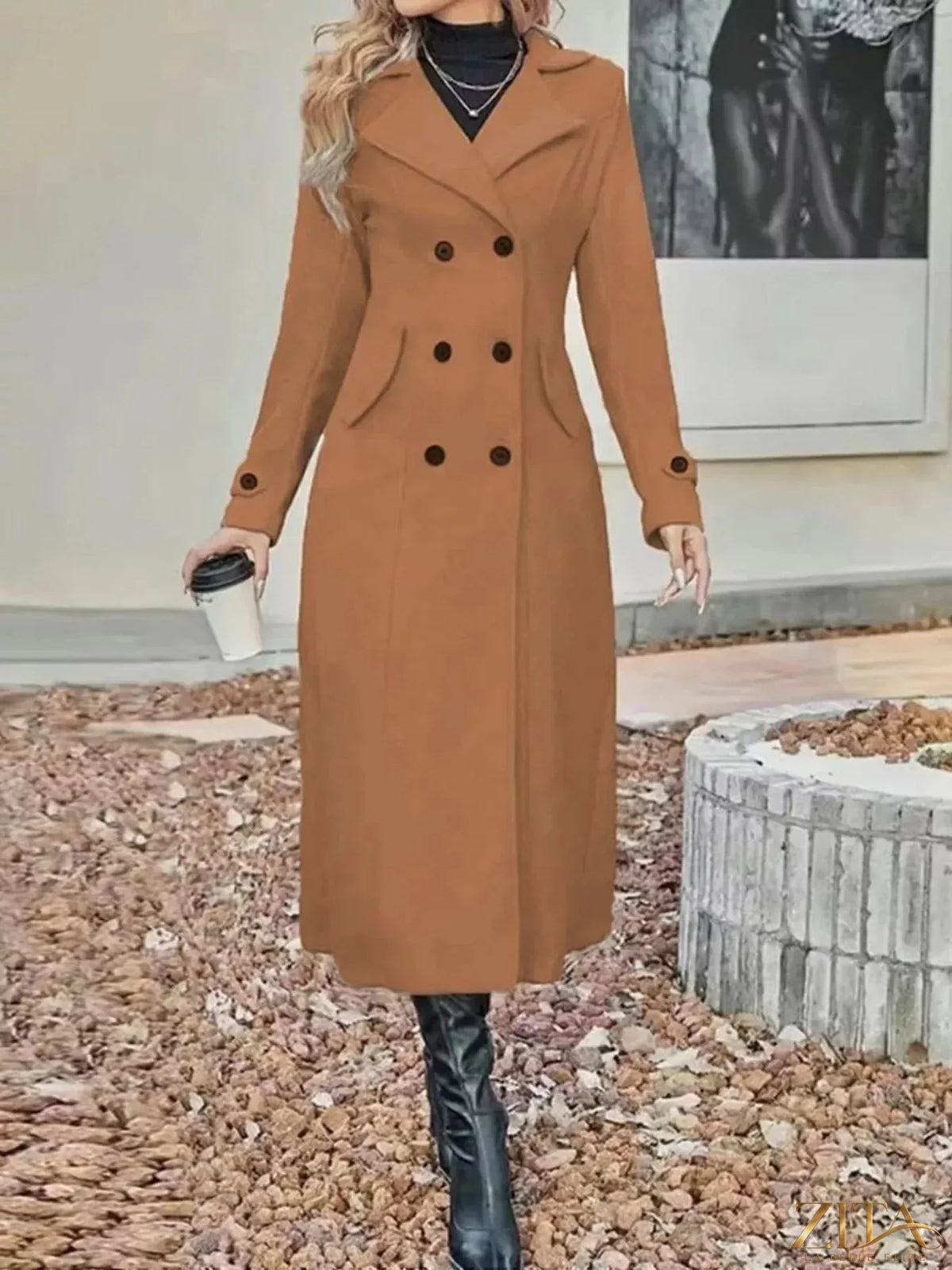 Plus size double-breasted longline trench coat by Zita La Belle Elite, showing a stylish beige outerwear with wide lapels and belt.