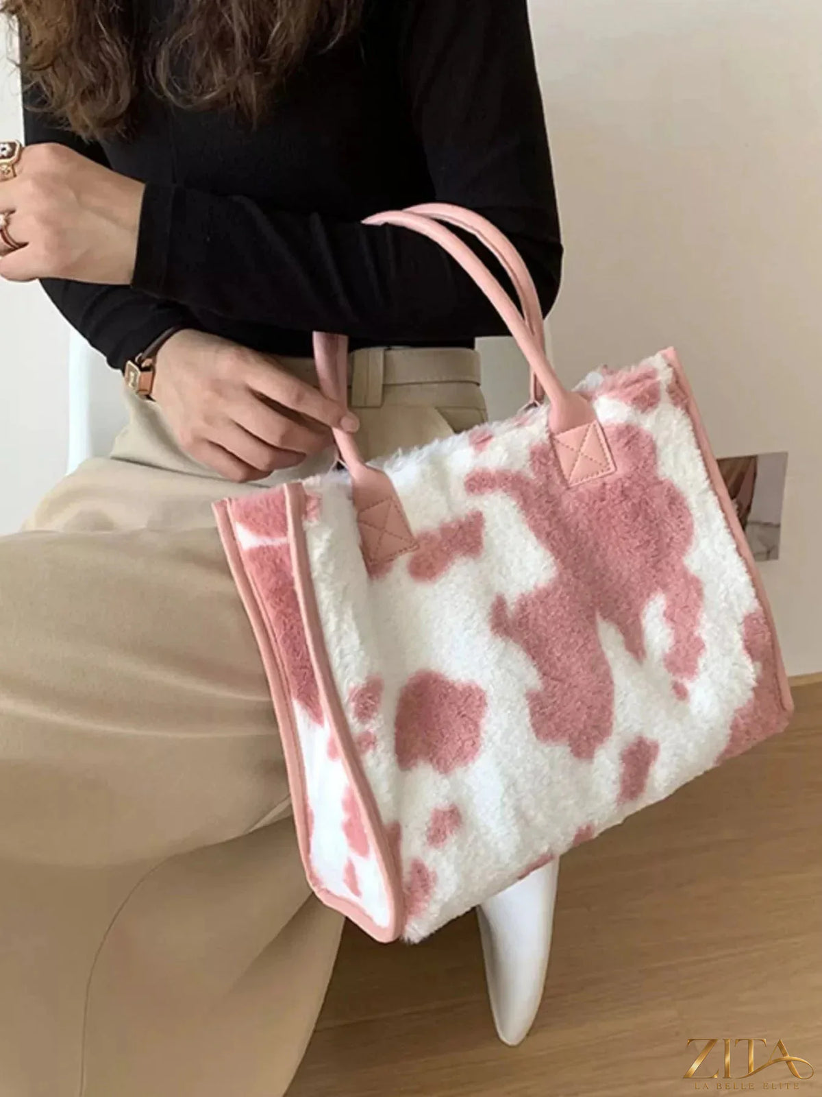 Zita La Belle Elite plush tote bag in soft pastel color, featuring a spacious design and comfortable handles.