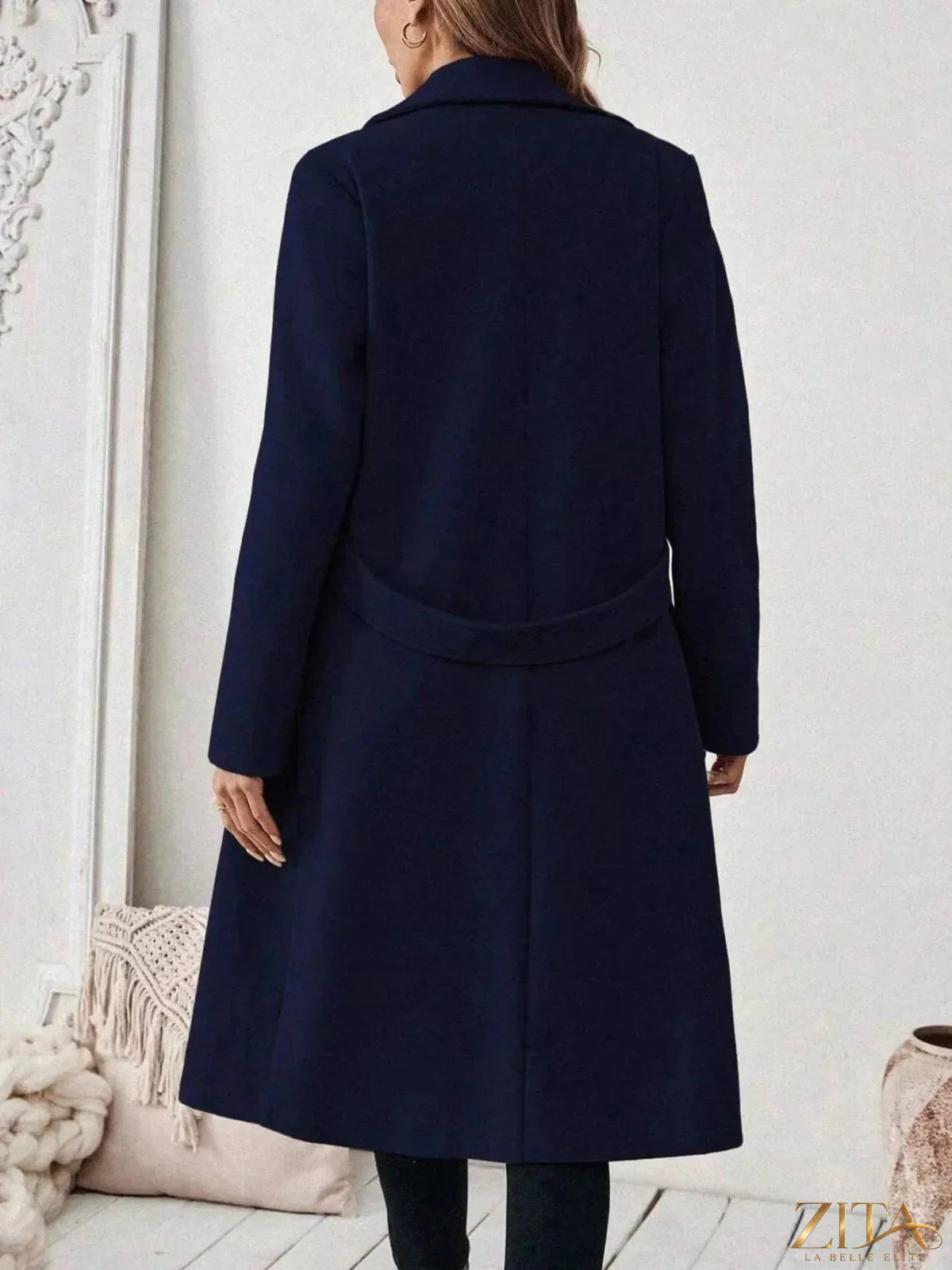 Zita La Belle Elite single-button longline coat in neutral fabric, displayed on a hanger against a plain background.