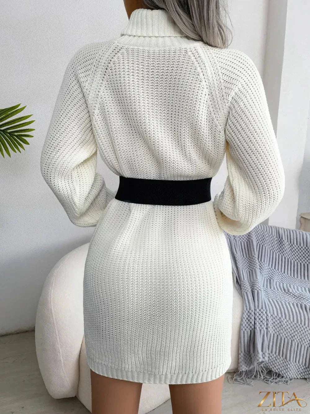 Decorative button turtleneck sweater dress by Trendsi featuring a cozy knit fabric and stylish design, shown from the front.