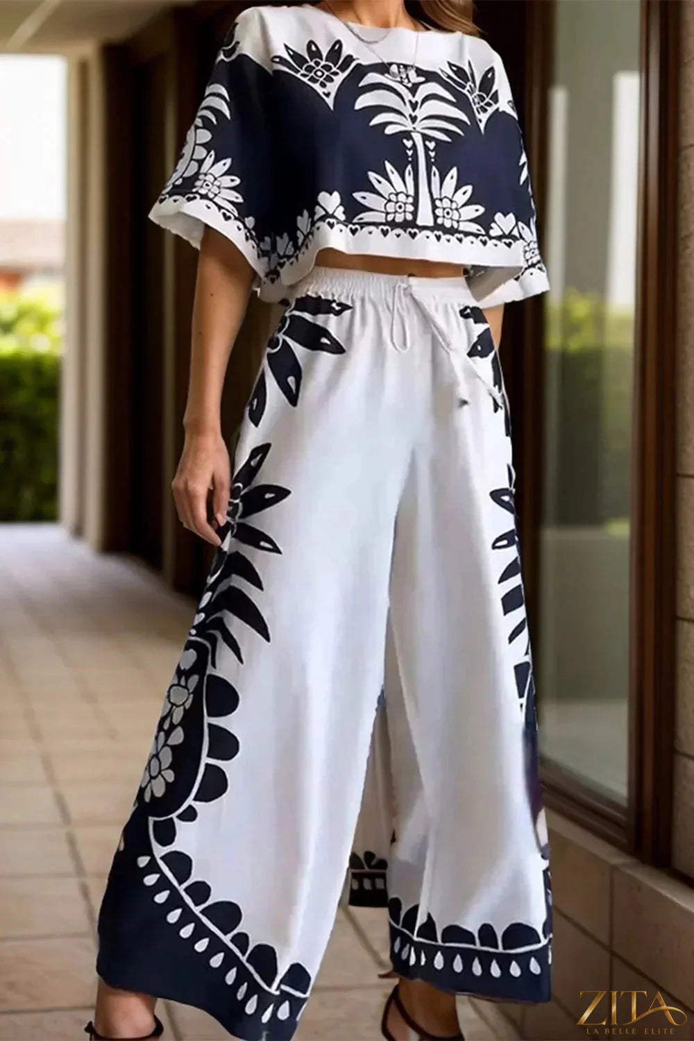Printed Zita La Belle Elite half sleeve top and wide leg pants set, casual fashion with colorful floral pattern.