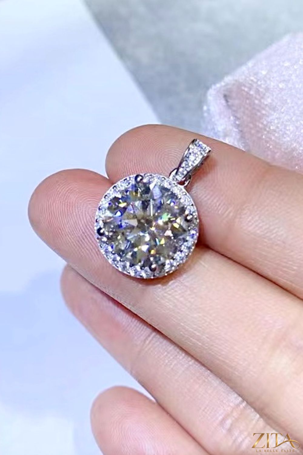 10-carat moissanite pendant on platinum-plated necklace, showcasing sparkling gemstone and elegant jewelry design.