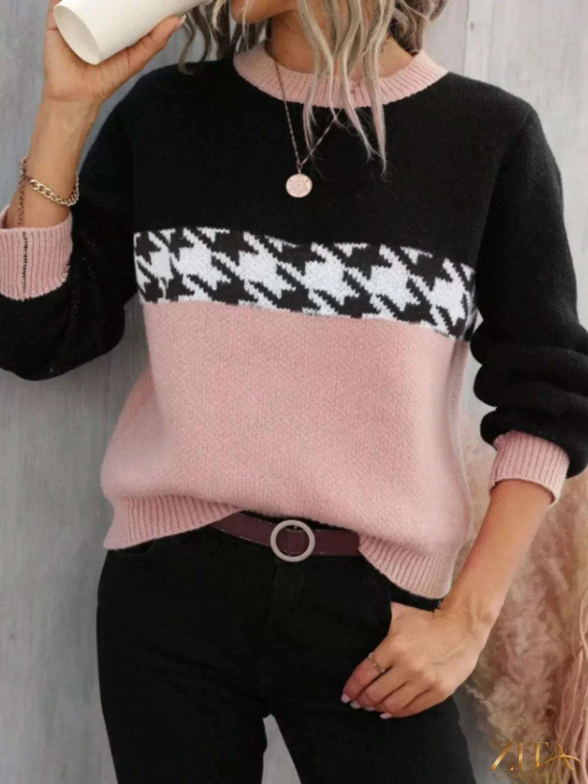 Color block houndstooth sweater by Trendsi, featuring a stylish mix of bold color blocks and classic houndstooth pattern.