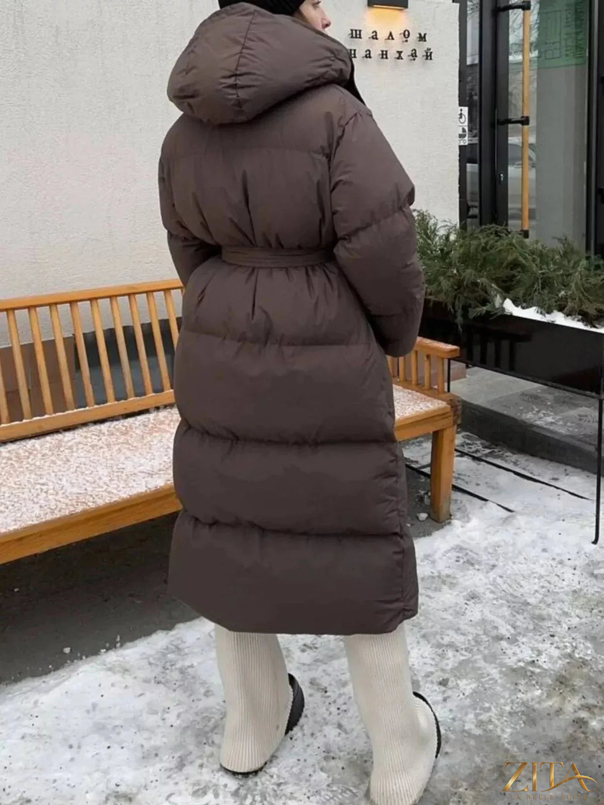 Longline padded winter coat with belt from Zita La Belle Elite, featuring a warm, insulated design and sleek silhouette