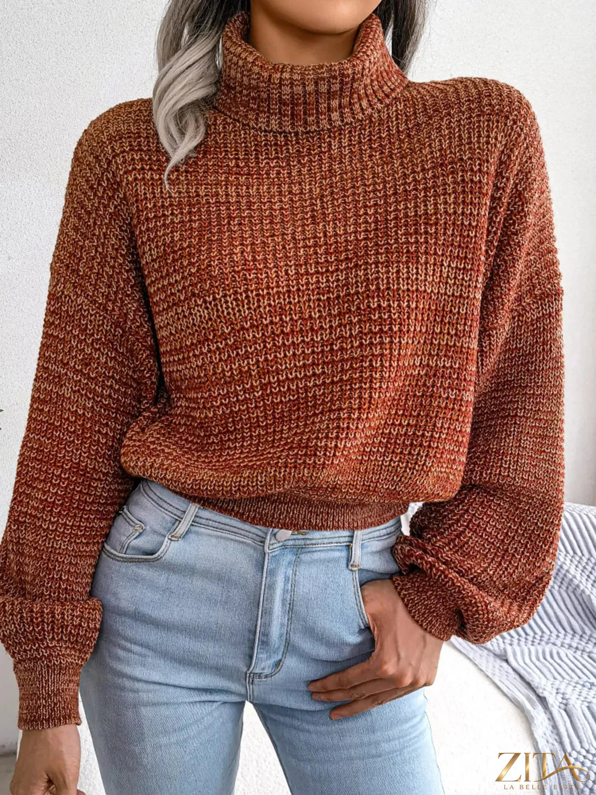 Cream-colored turtleneck dropped shoulder sweater by Trendsi, featuring a cozy knit design and relaxed fit.
