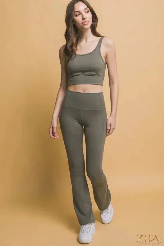 Love Tree high waist flare active leggings with side pockets, shown in black, featuring a sleek fit and stylish side pocket details.