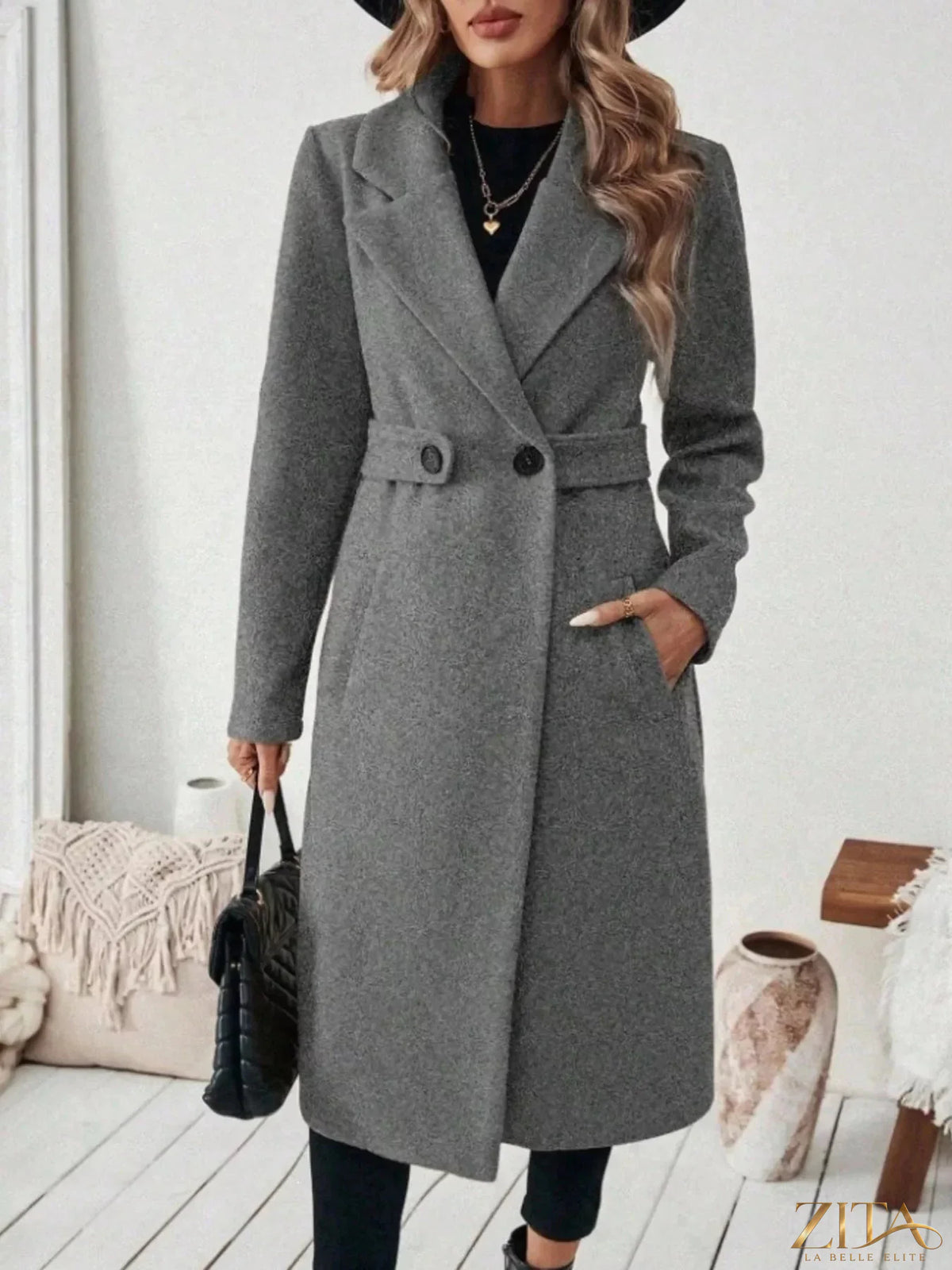 Plus size Zita La Belle Elite coat with elegant lapel collar, belt, and pockets, showcasing a full-length belted coat design.