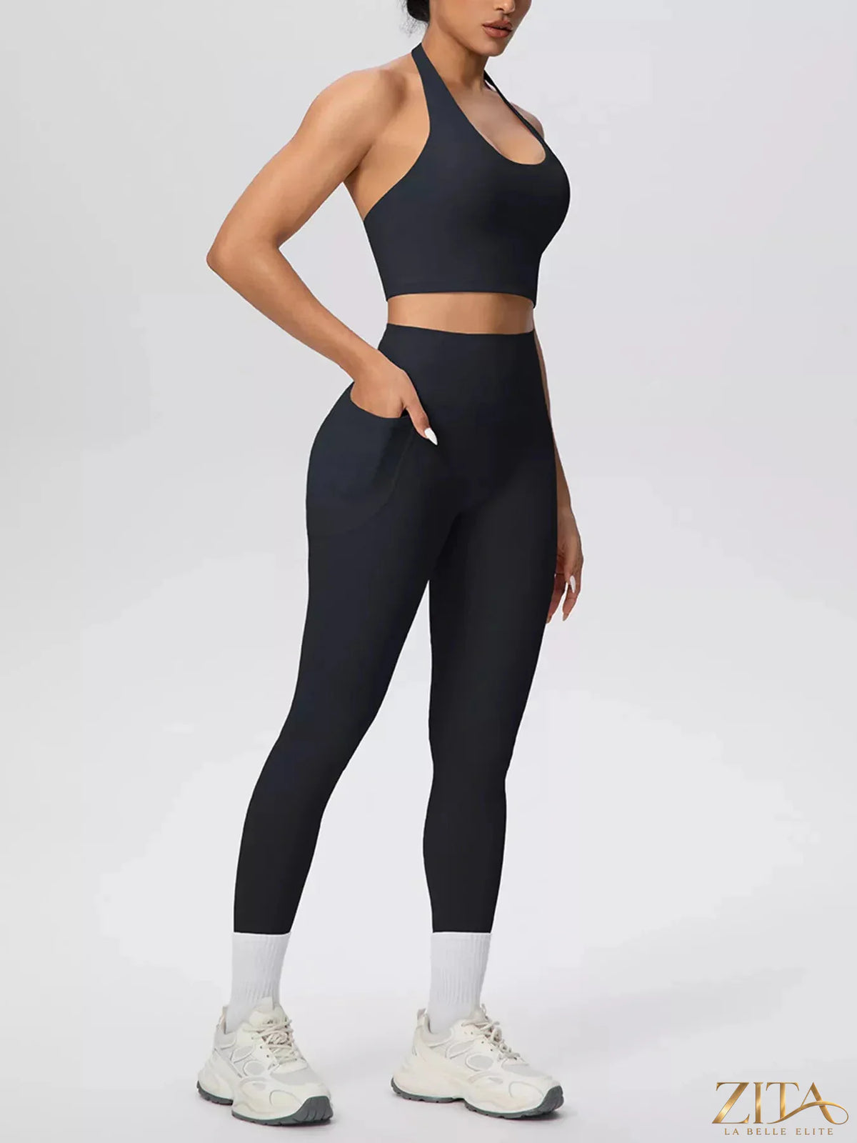Zita La Belle Elite halter neck crop top and high-waisted leggings active set on a model, ideal for workout or casual wear.