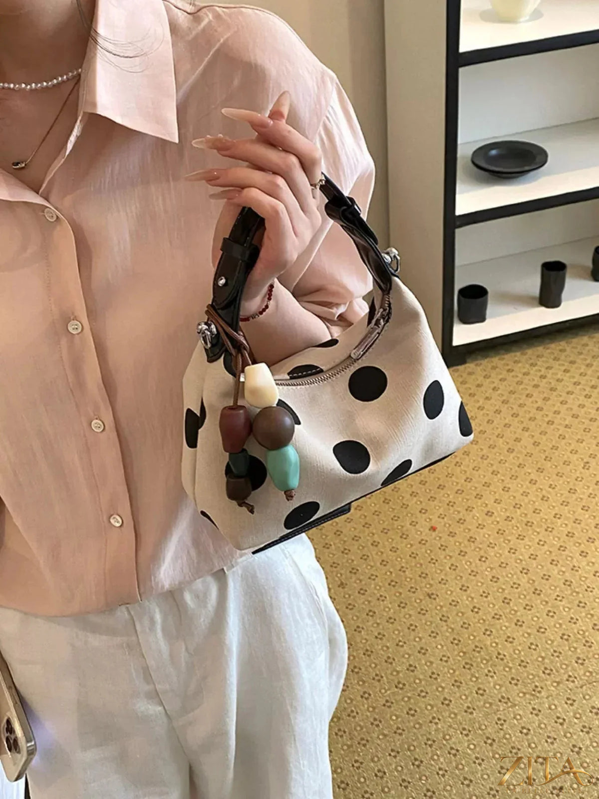 Zita La Belle Elite polka dot PU leather handbag with top handle and gold accents, showcasing stylish design and spacious interior.