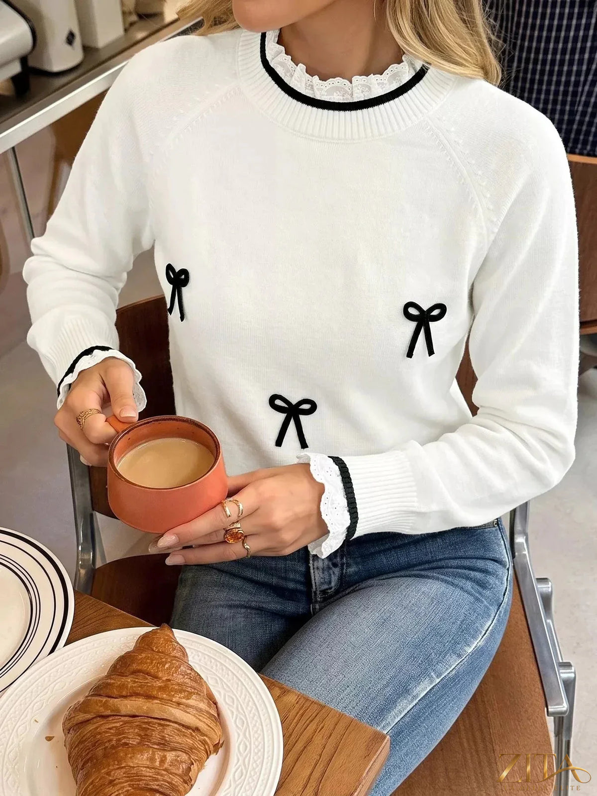 Zita La Belle Elite lace trim sweater with bow embellishments, featuring delicate lace details and a stylish, cozy fit.