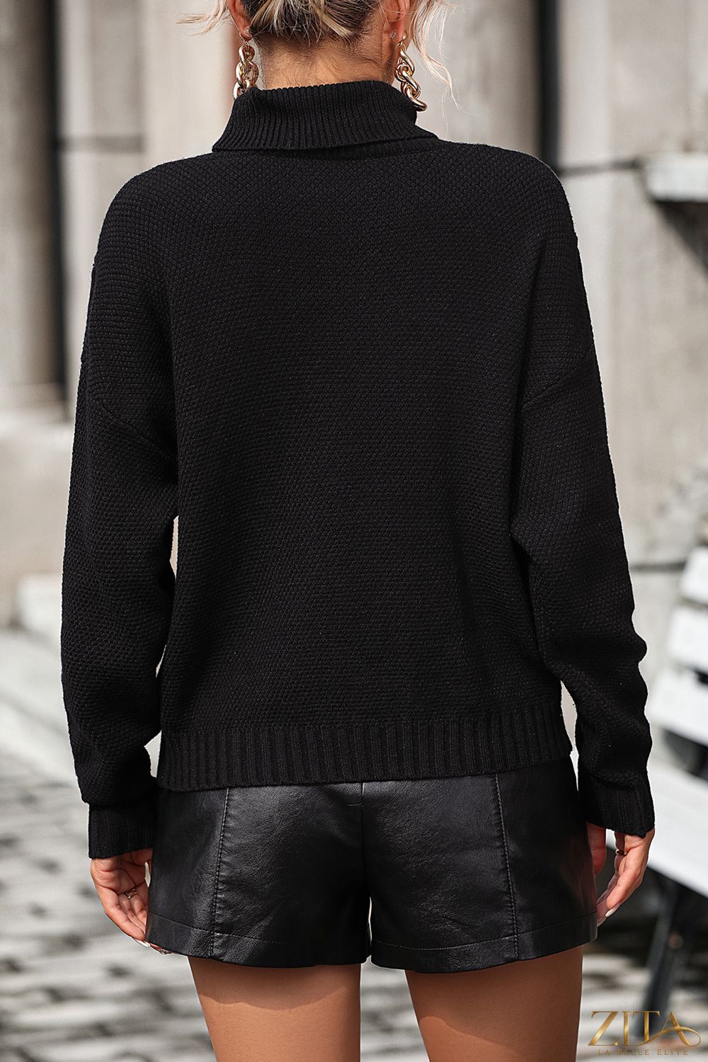 Trendsi turtle neck long sleeve sweater with tassel front, featuring a cozy pullover design in soft knit fabric.