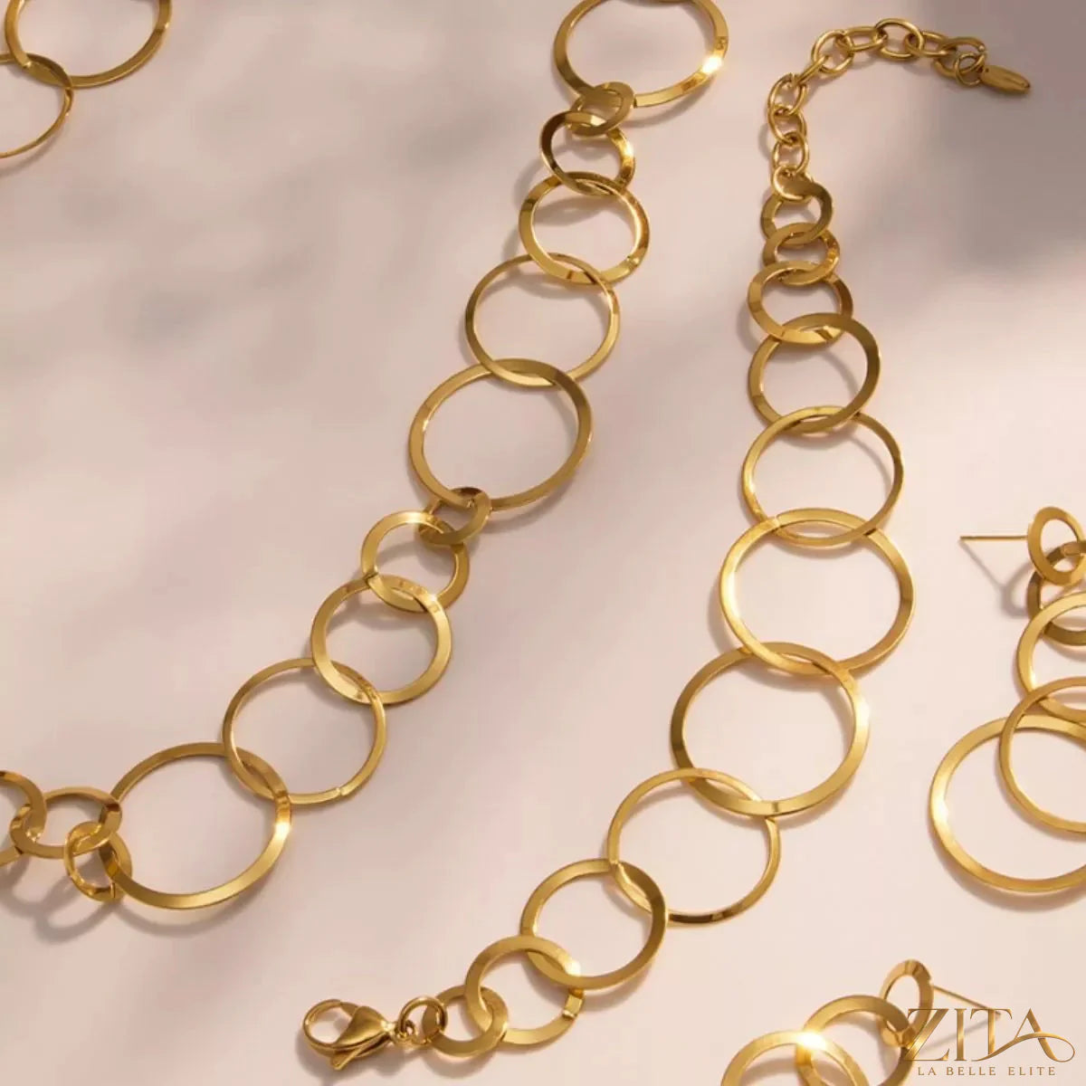 18K gold-plated titanium steel round bracelet by Zita La Belle Elite, featuring a sleek, polished design with a smooth circular shape.