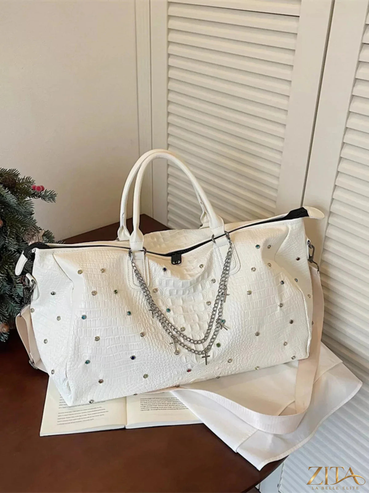 Zita La Belle Elite studded large capacity travel bag with multiple compartments and sturdy handles, ideal for extended trips.