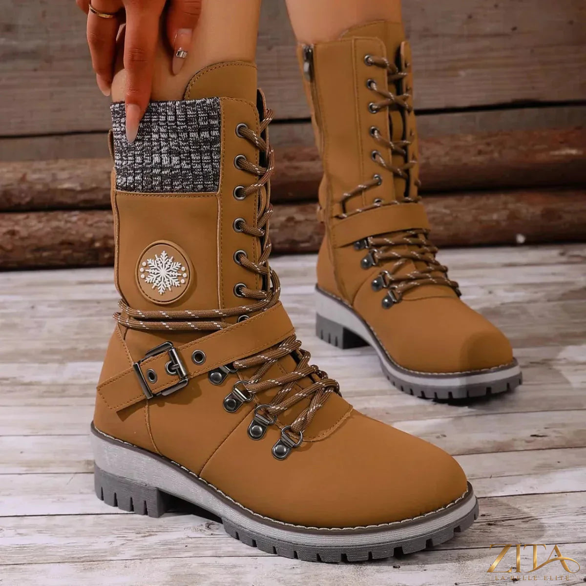 Black lace-up ankle combat boots with chunky soles, featuring metal eyelets and stylish design by Trendsi.