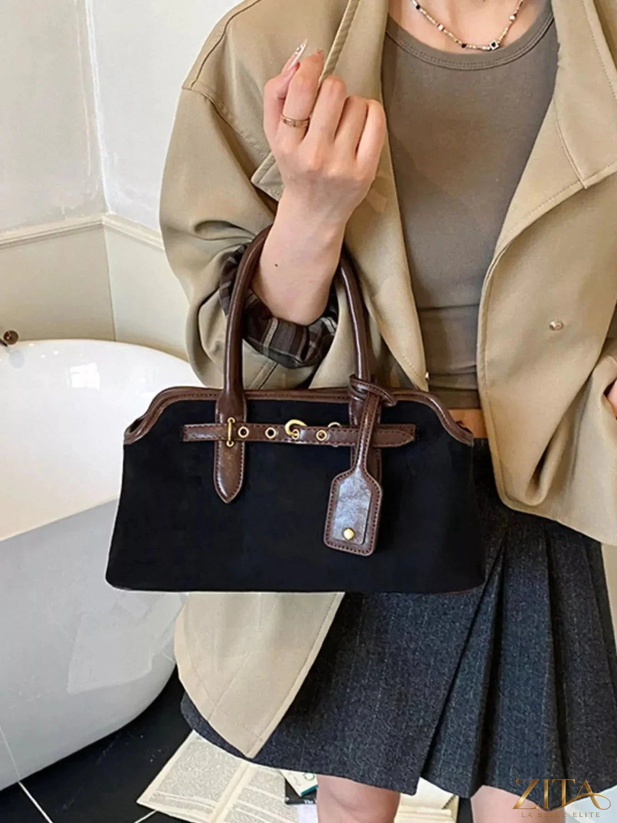 Vintage Zita La Belle Elite handbag with buckle detail, featuring a classic leather design and elegant craftsmanship.