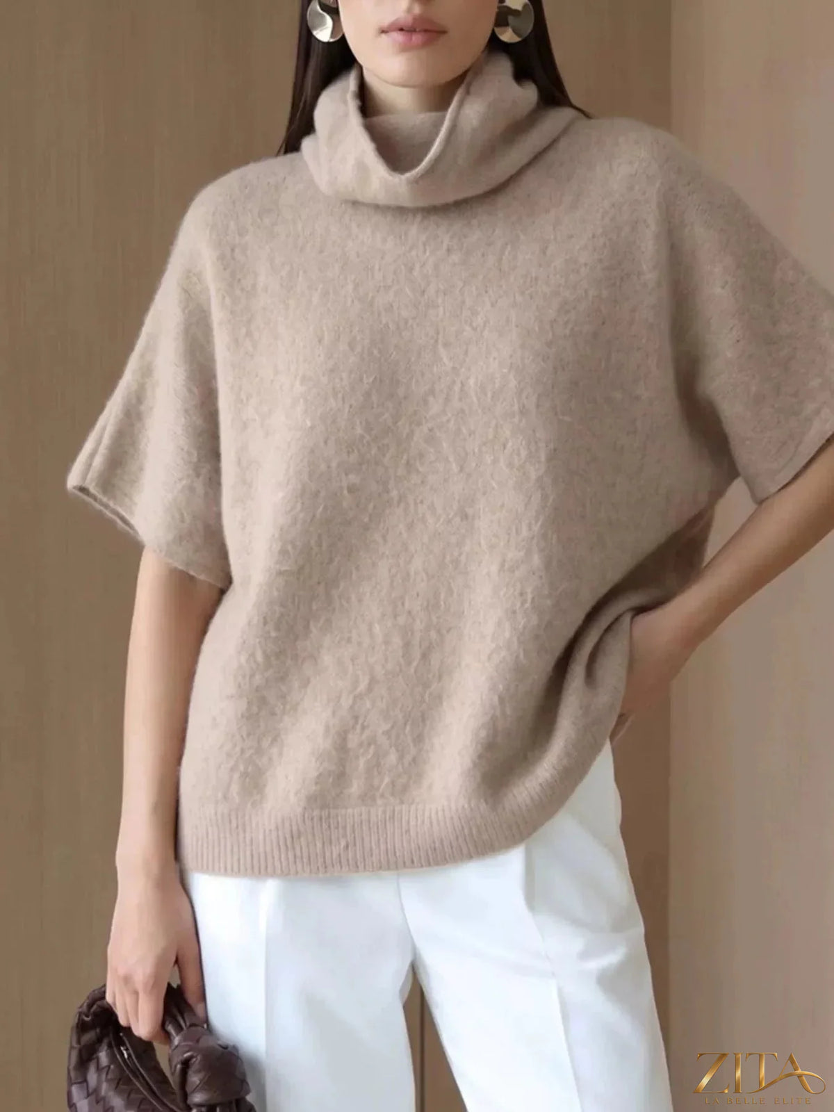 Zita La Belle Elite fuzzy short sleeve turtleneck sweater in soft, cozy fabric with a fitted silhouette and ribbed neckline.
