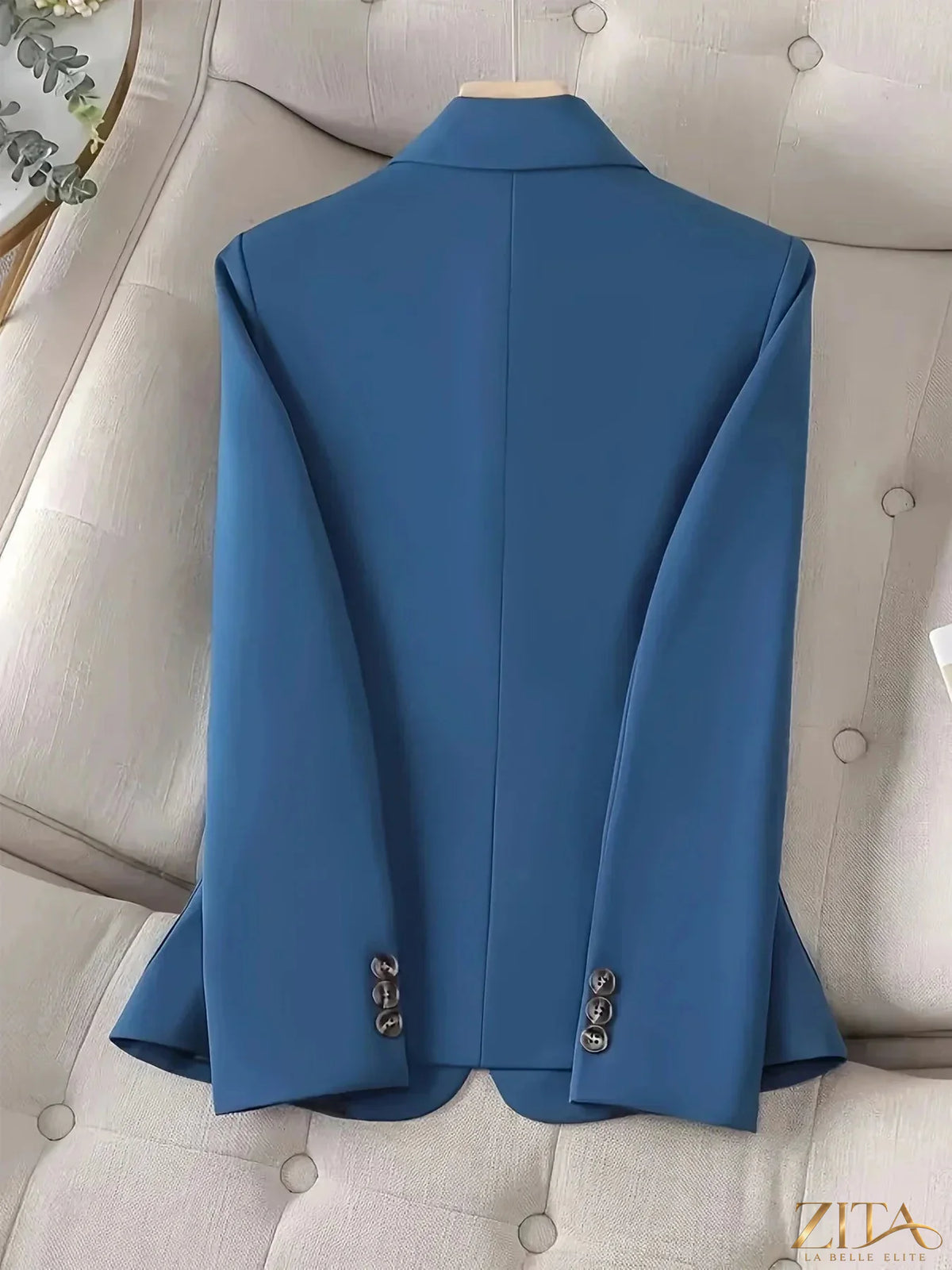 Navy one-button blazer with pockets from Trendsi, tailored fit, featuring classic lapel and sleek design, styled on a mannequin.