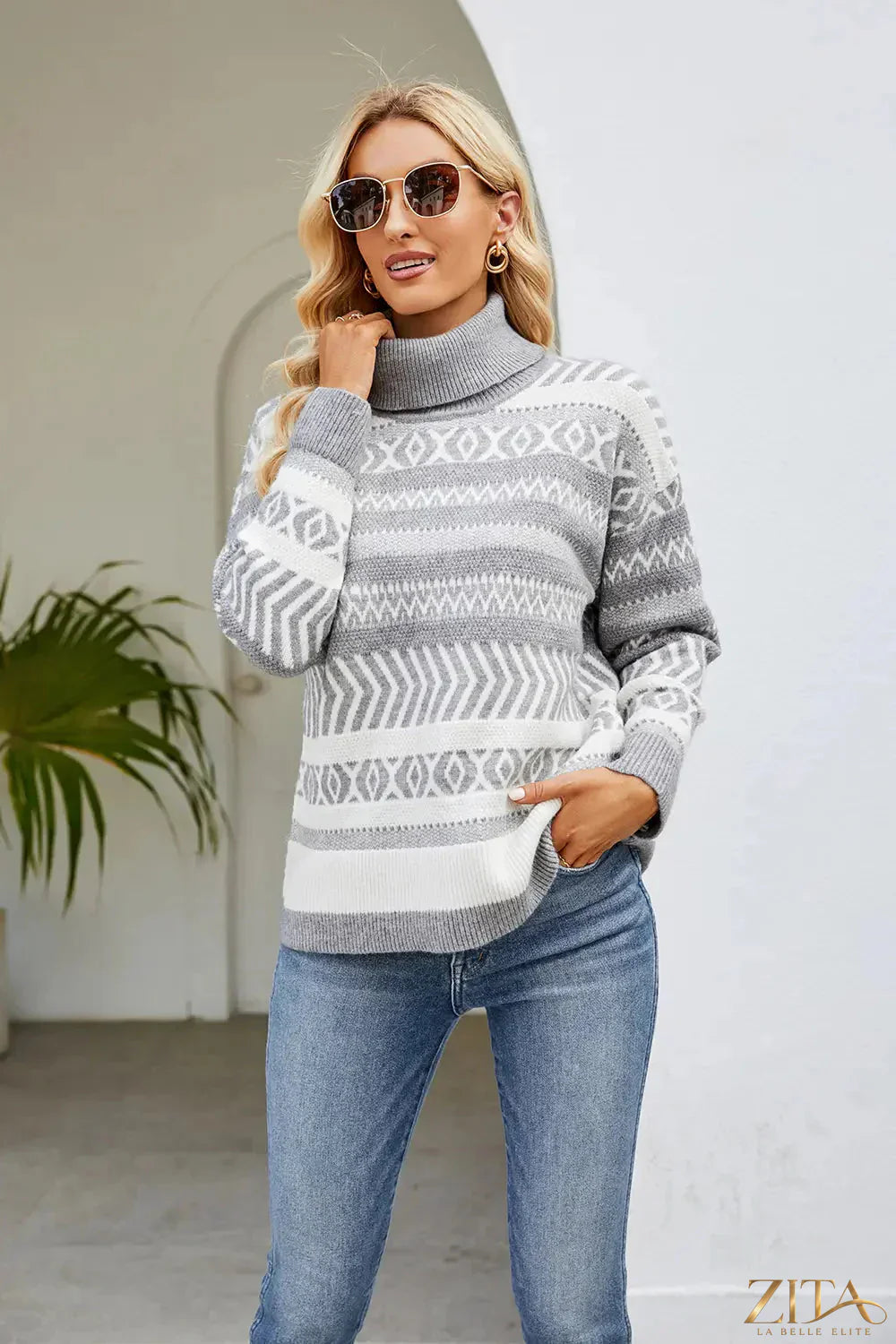 Geometric pattern turtleneck long sleeve sweater by Trendsi, featuring a stylish design and cozy fit for cold weather.