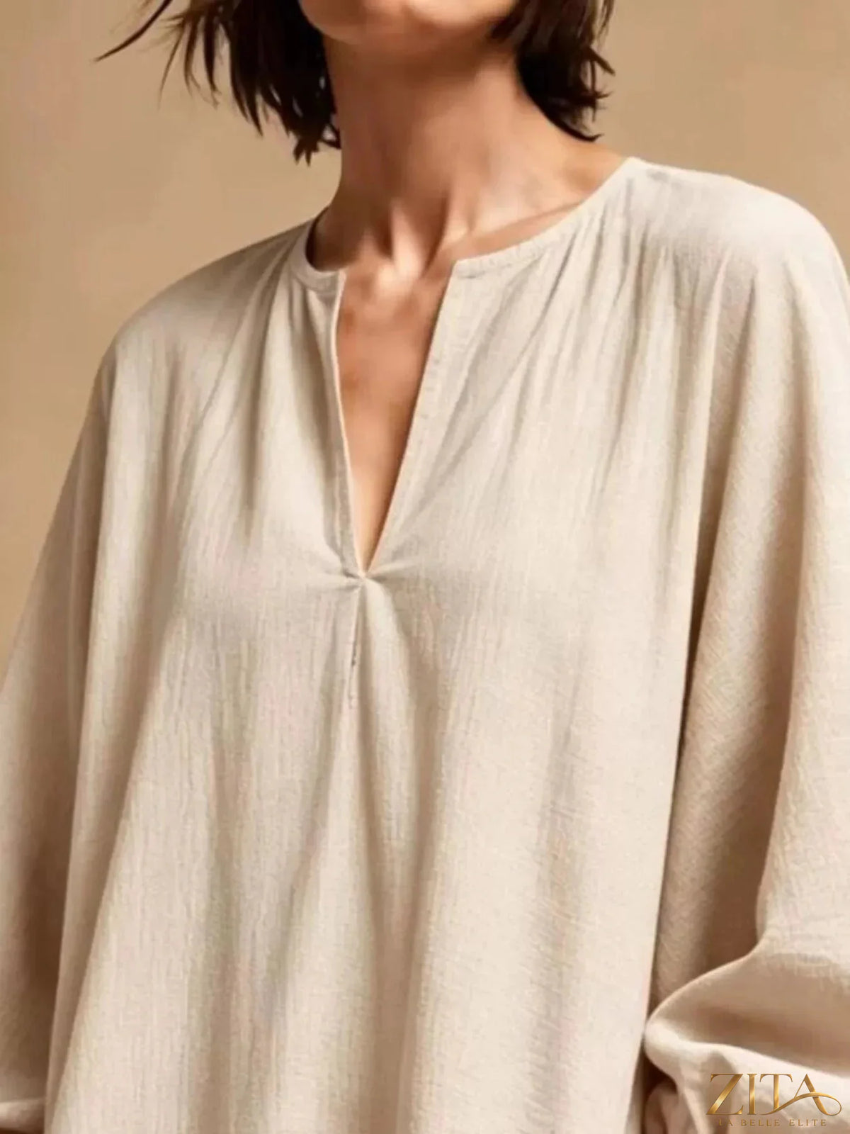Zita La Belle Elite casual loose-fit mini dress with balloon sleeves and pockets, stylish and comfortable everyday wear.