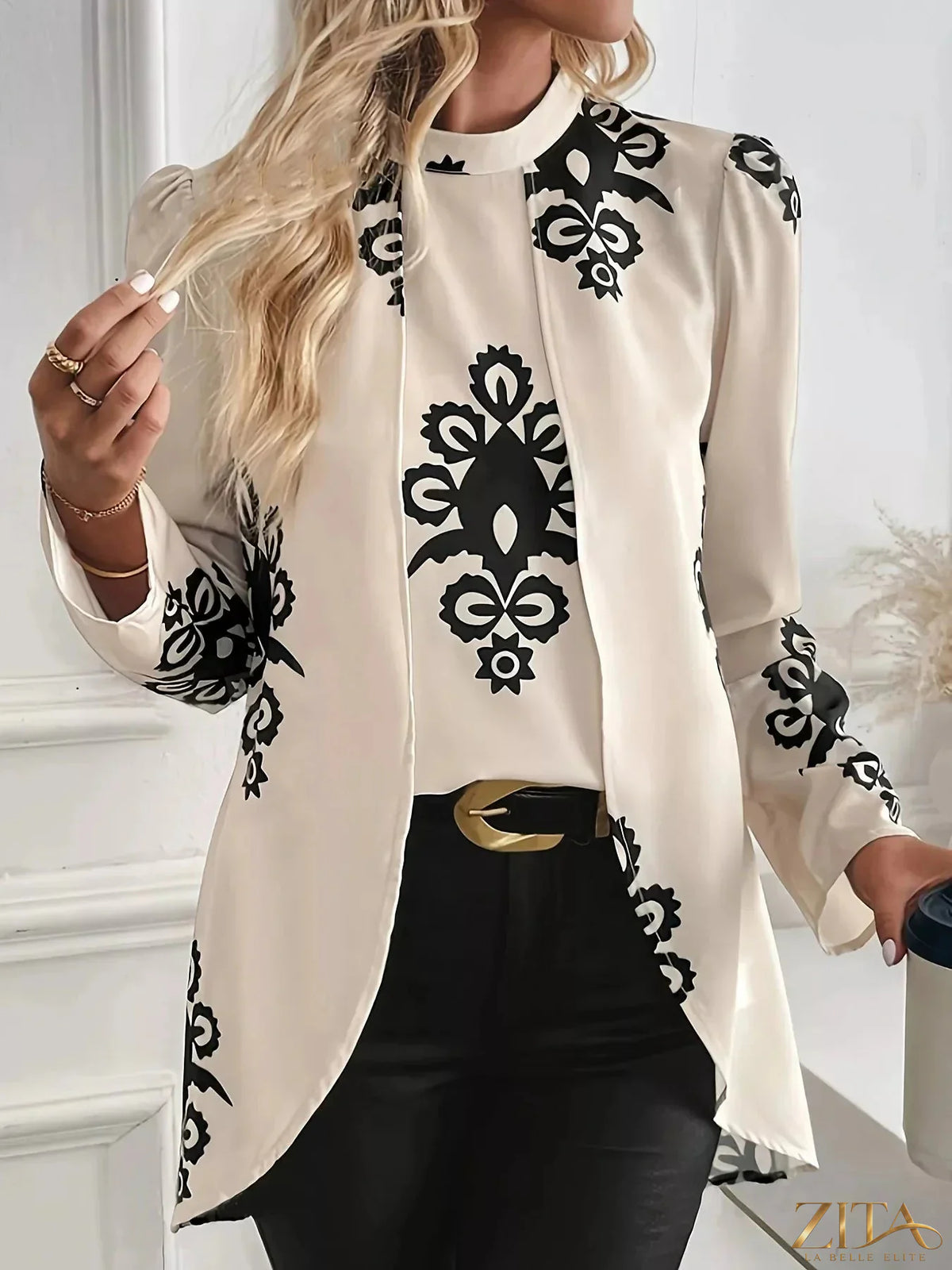 Zita La Belle Elite printed long sleeve blouse with floral pattern, lightweight fabric, and button-front design.