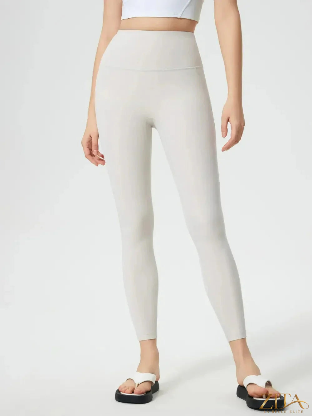 Trendsi Millennia wide waistband active leggings in black, featuring a high-rise fit and stretchy fabric for comfortable movement.