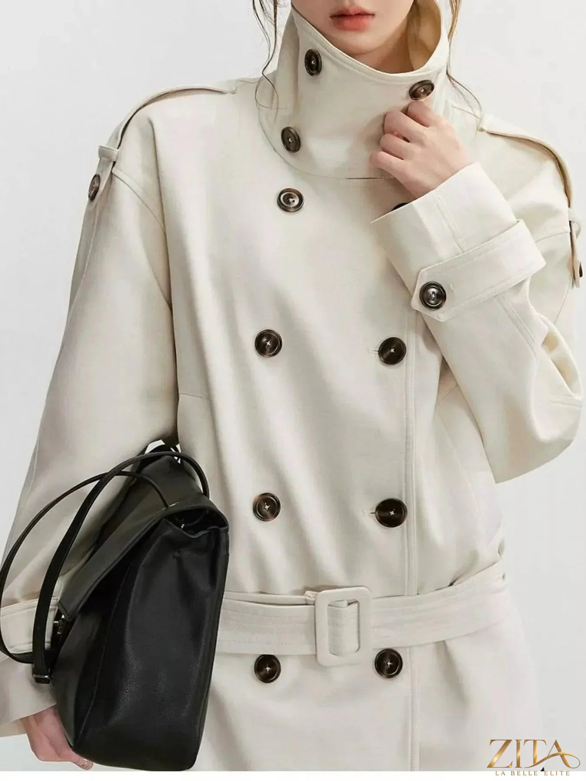 Zita La Belle Elite double-breasted turtleneck trench coat in neutral color, stylish outerwear with button details and classic silhouette.