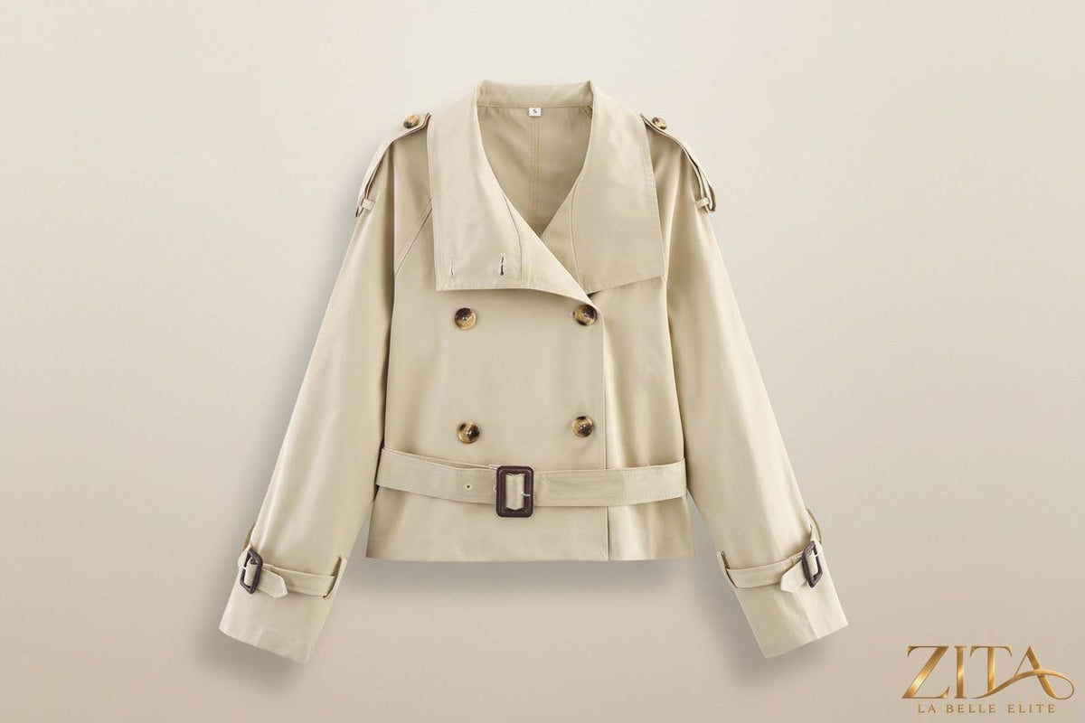 Women's short trench coat with notch collar and belt buckle detail by Zita La Belle Elite, stylish outerwear for women.