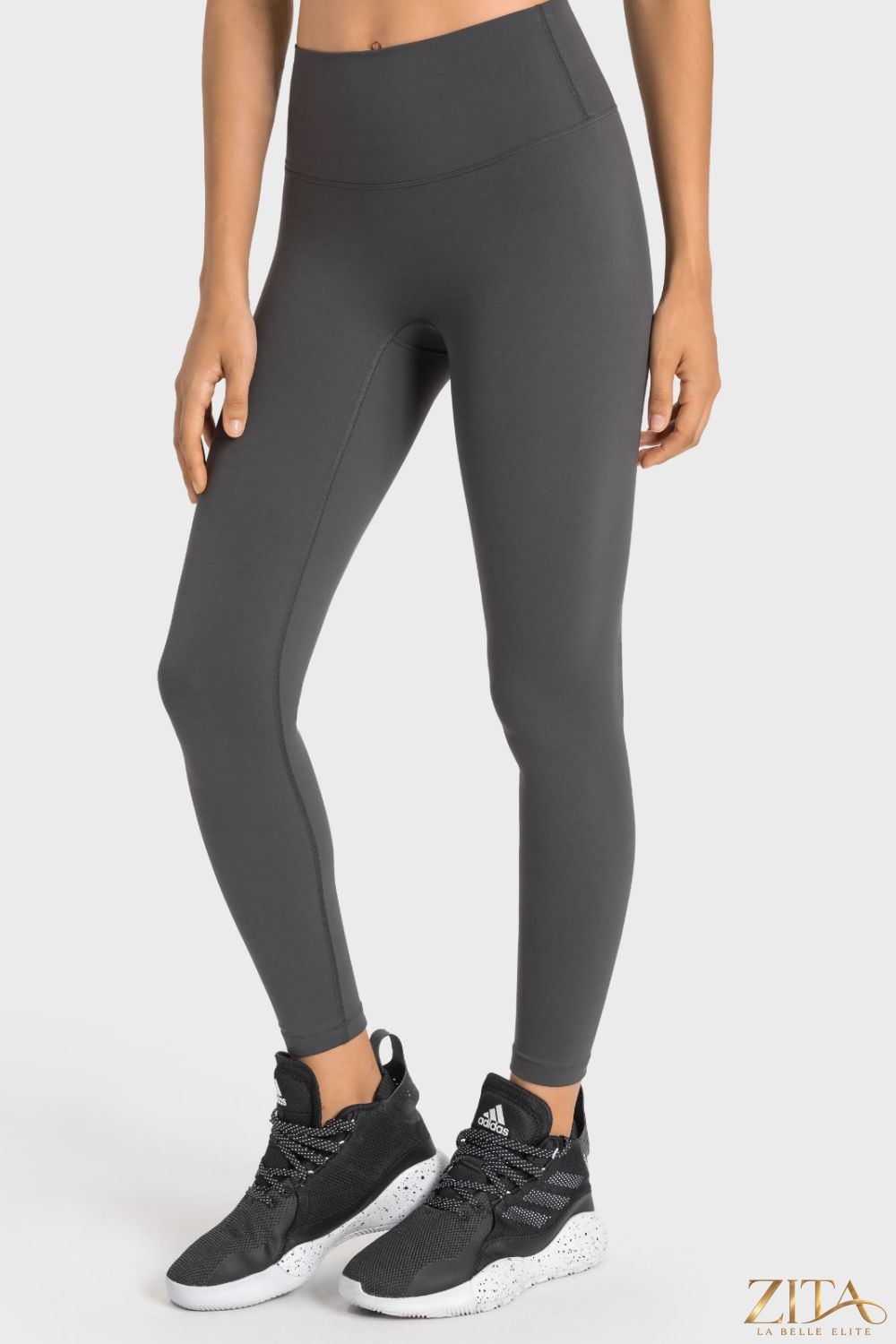 Trendsi Millennia high-rise wide waistband yoga leggings in black, stretchy fabric, designed for comfort and support during exercise.