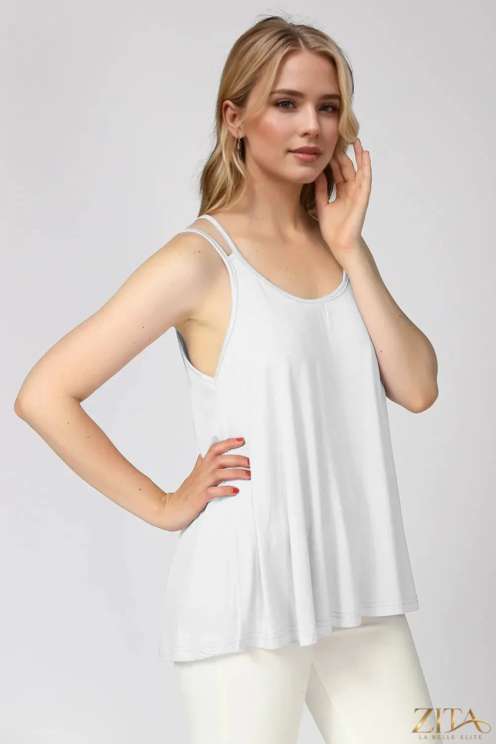 Zita La Belle Elite Basic Bae bamboo cami with scoop neck and double spaghetti straps, in natural fabric, laid flat.