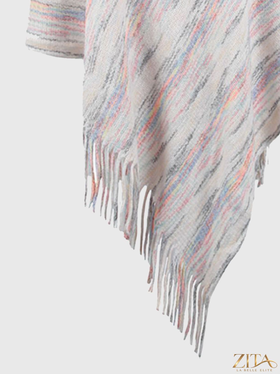 Zita La Belle Elite fringe hem hooded poncho in neutral fabric with tassel accents, casual outerwear for women.